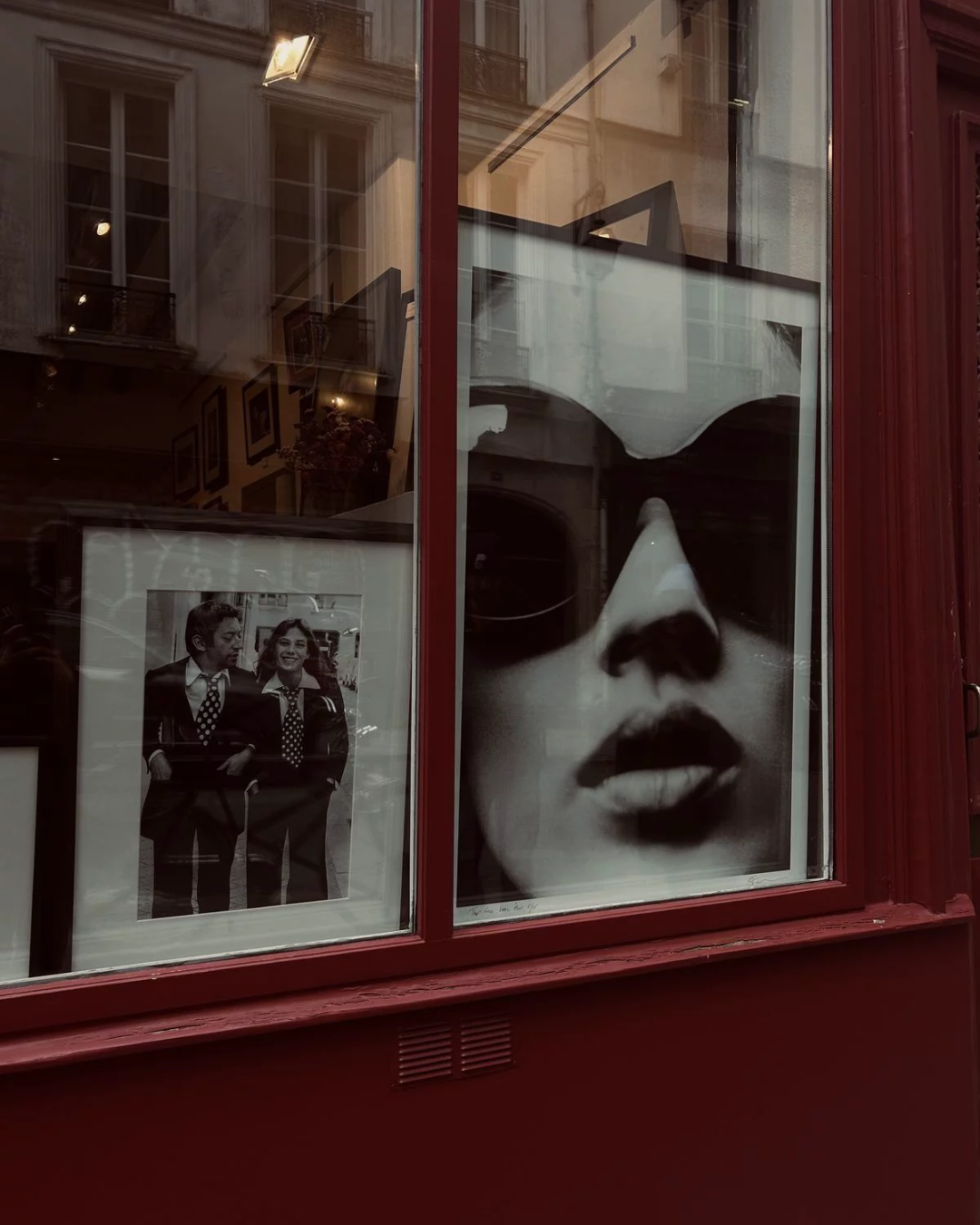 Framed prints on a gallery wall