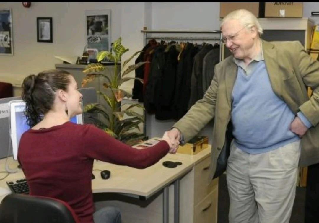 Sir David Attenborough shaking Ruth Hendry's hand