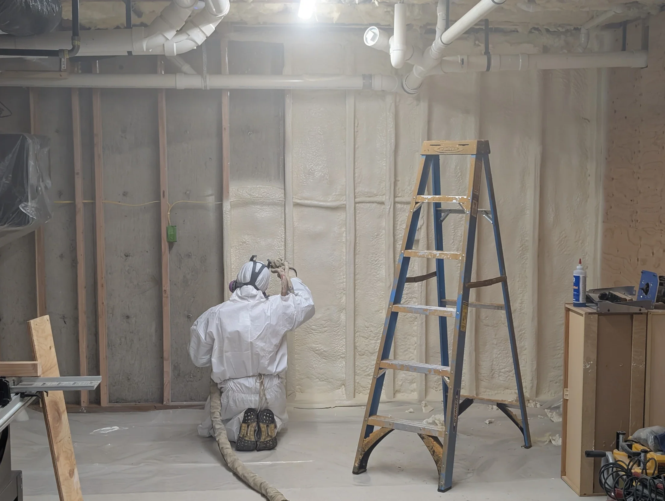 BASE CAMP SPRAY FOAM INSULATION IN BASEMENT