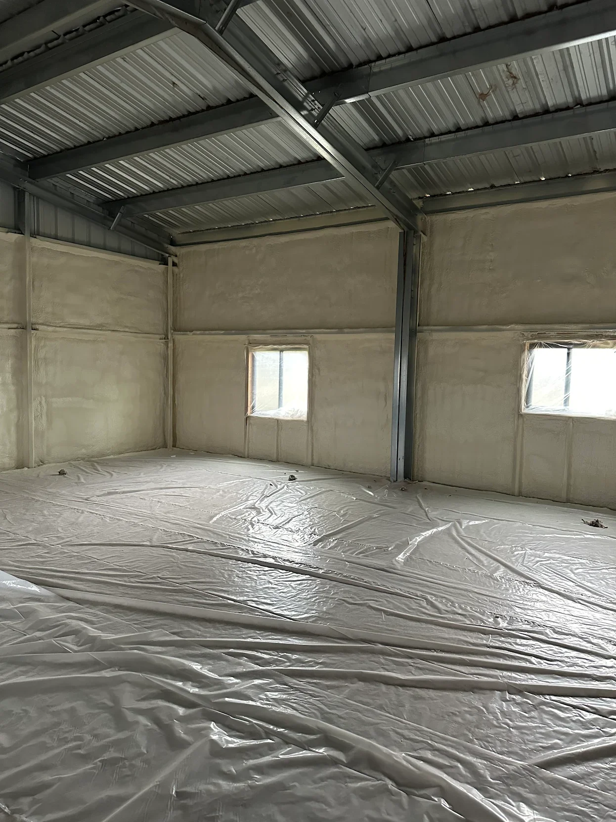 BASE CAMP SPRAY FOAM INSULATION METAL BUILDING 2