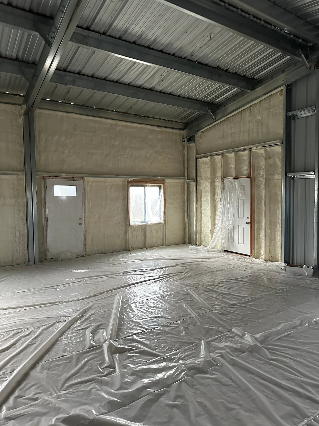 BASE CAMP SPRAY FOAM INSULATION METAL BUILDING 3