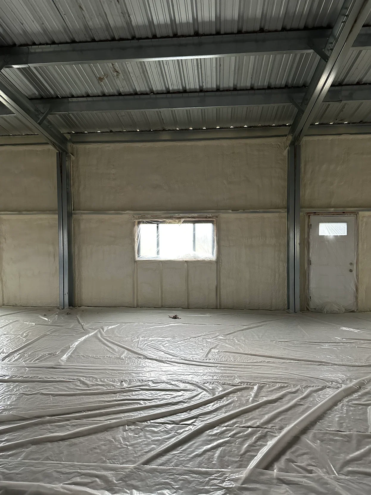 BASE CAMP SPRAY FOAM INSULATION METAL BUILDING 1