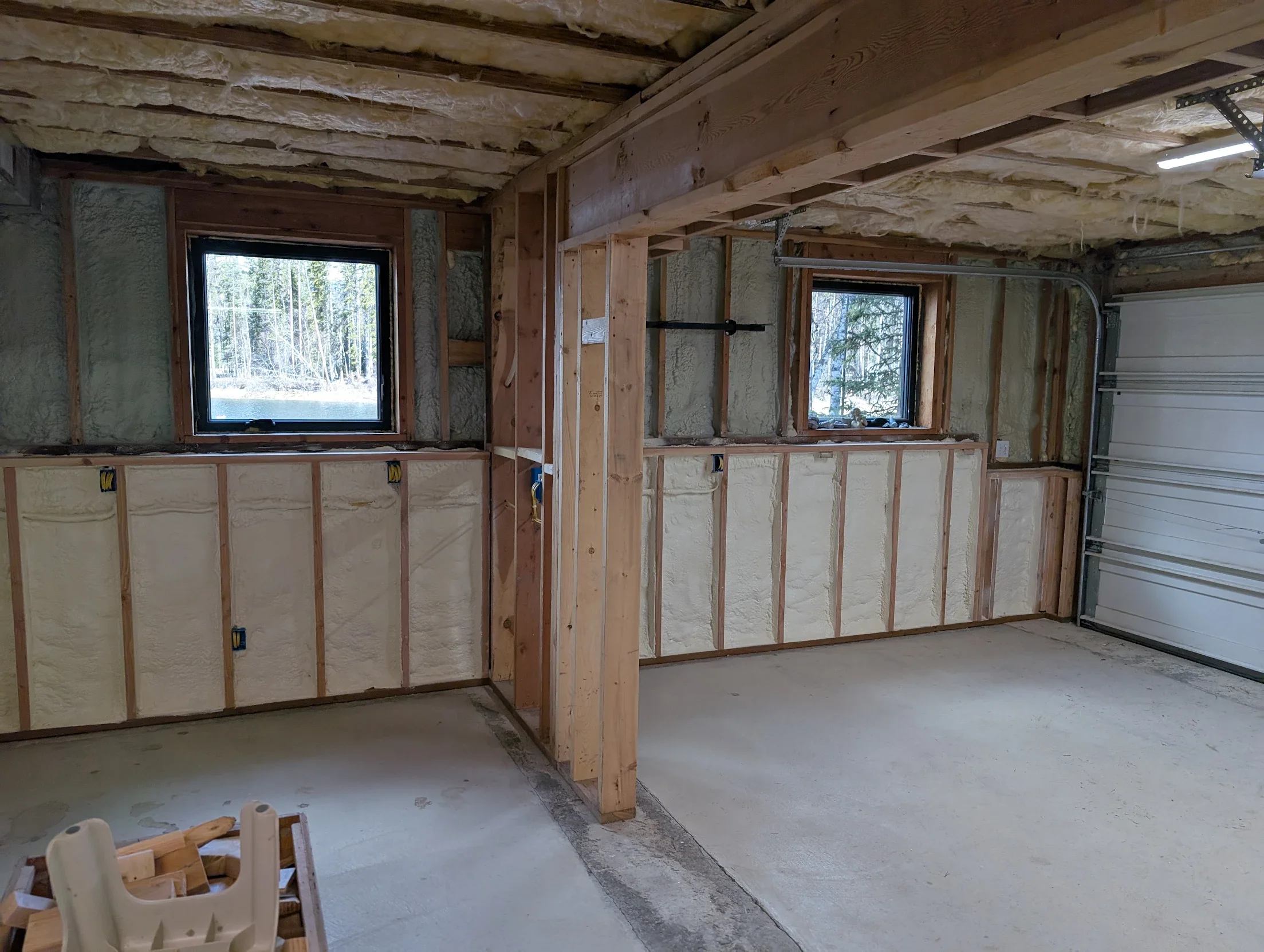 BASE CAMP SPRAY FOAM INSULATION IN GARAGE WALLS