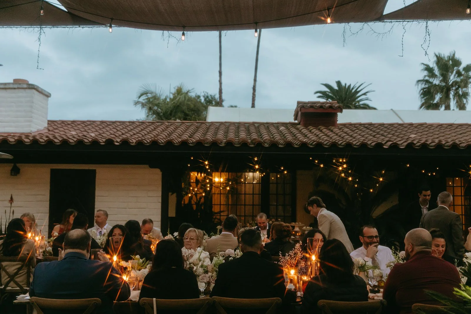 A wedding reception taking place outside at Tivoli