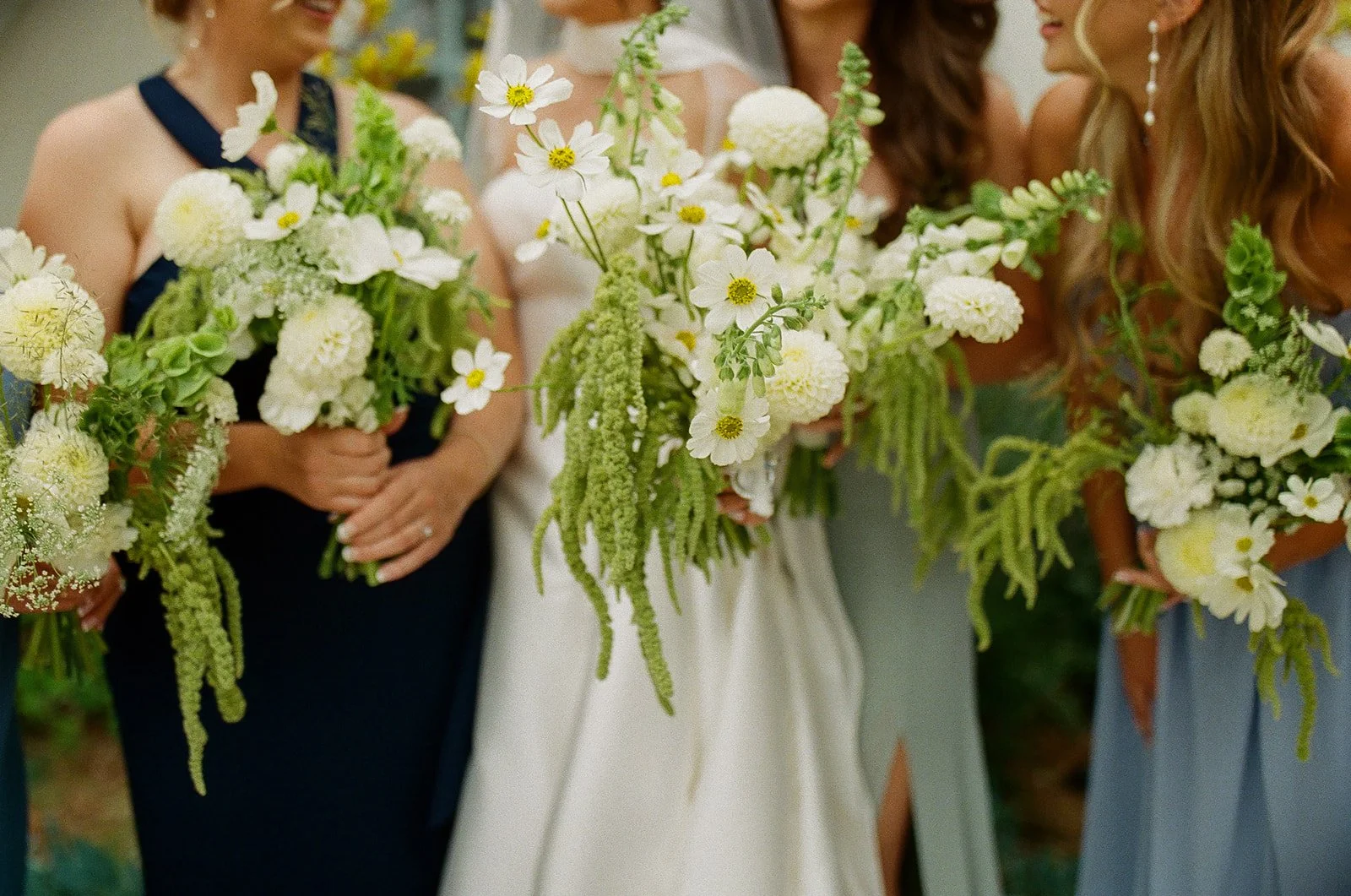 A bride and bridesmaids posing for a san clemente wedding
