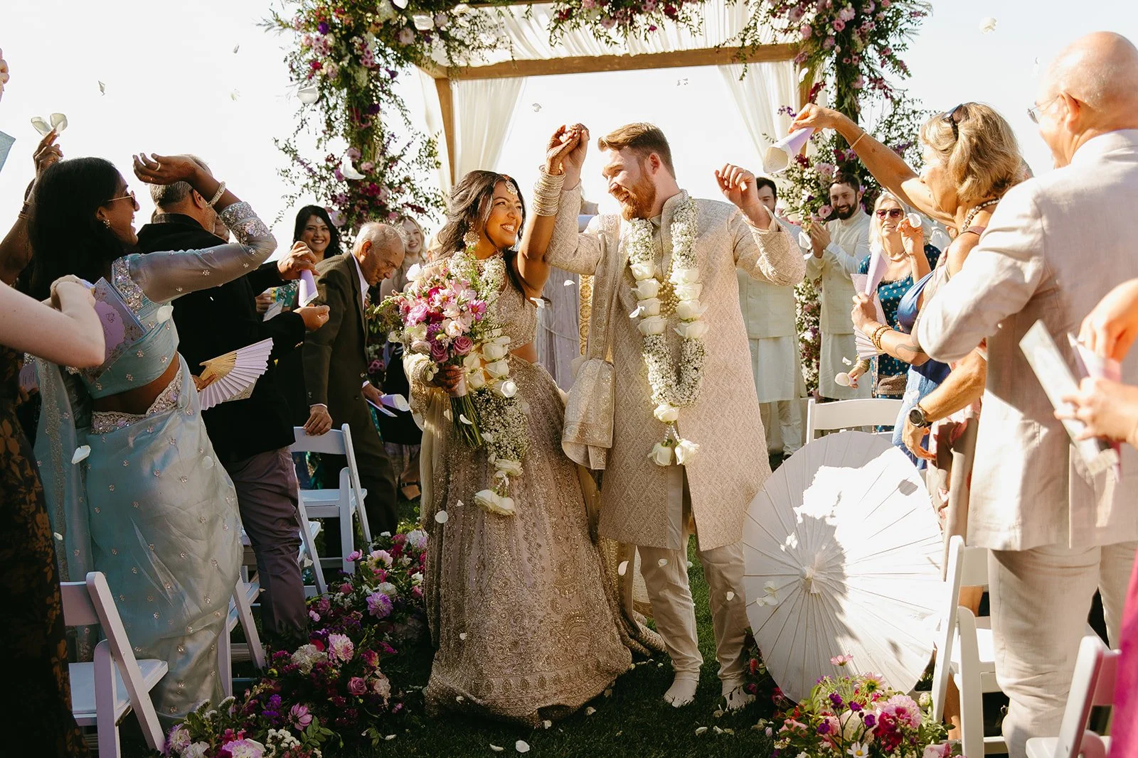 A couple celebrating their wedding ceremony
