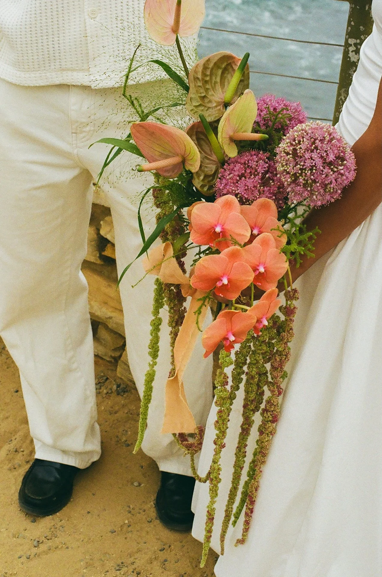 A detail shot of the brides wedding bouquet