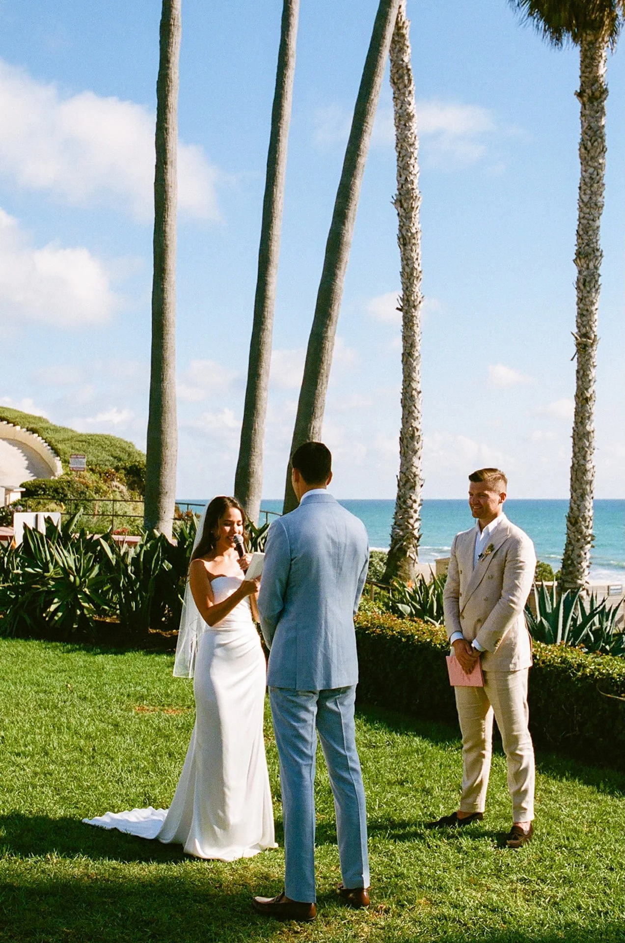 The bride reads her vows to the groom during their ceremony at a San Juan Capistrano Wedding Venue.