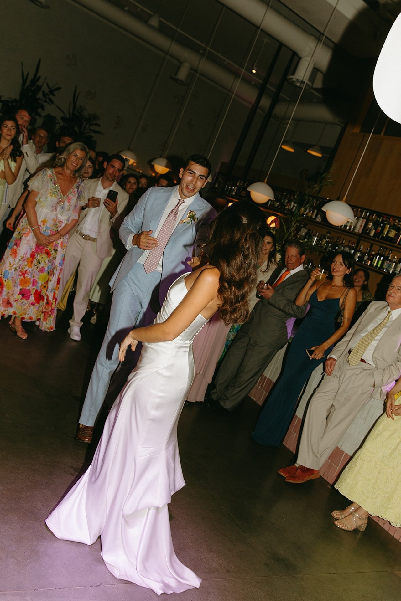 The bride and groom sharing their first dance during their wedding reception at The Mayfield in CA.