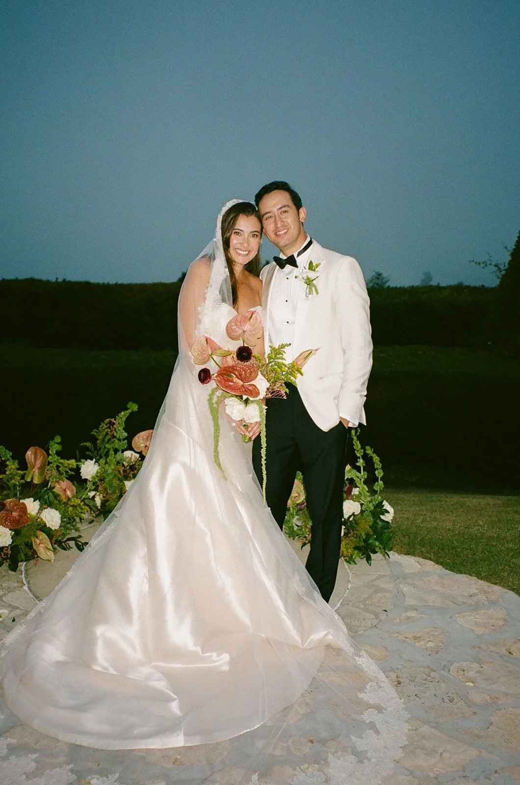 Bride and groom smiling together during formal portraits at a Historic Wedding Venue.