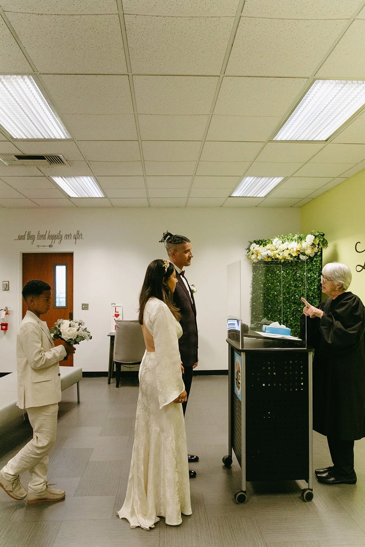 Couple standing in the courtroom saying their vows for their Beverly Hills Courthouse Elopement