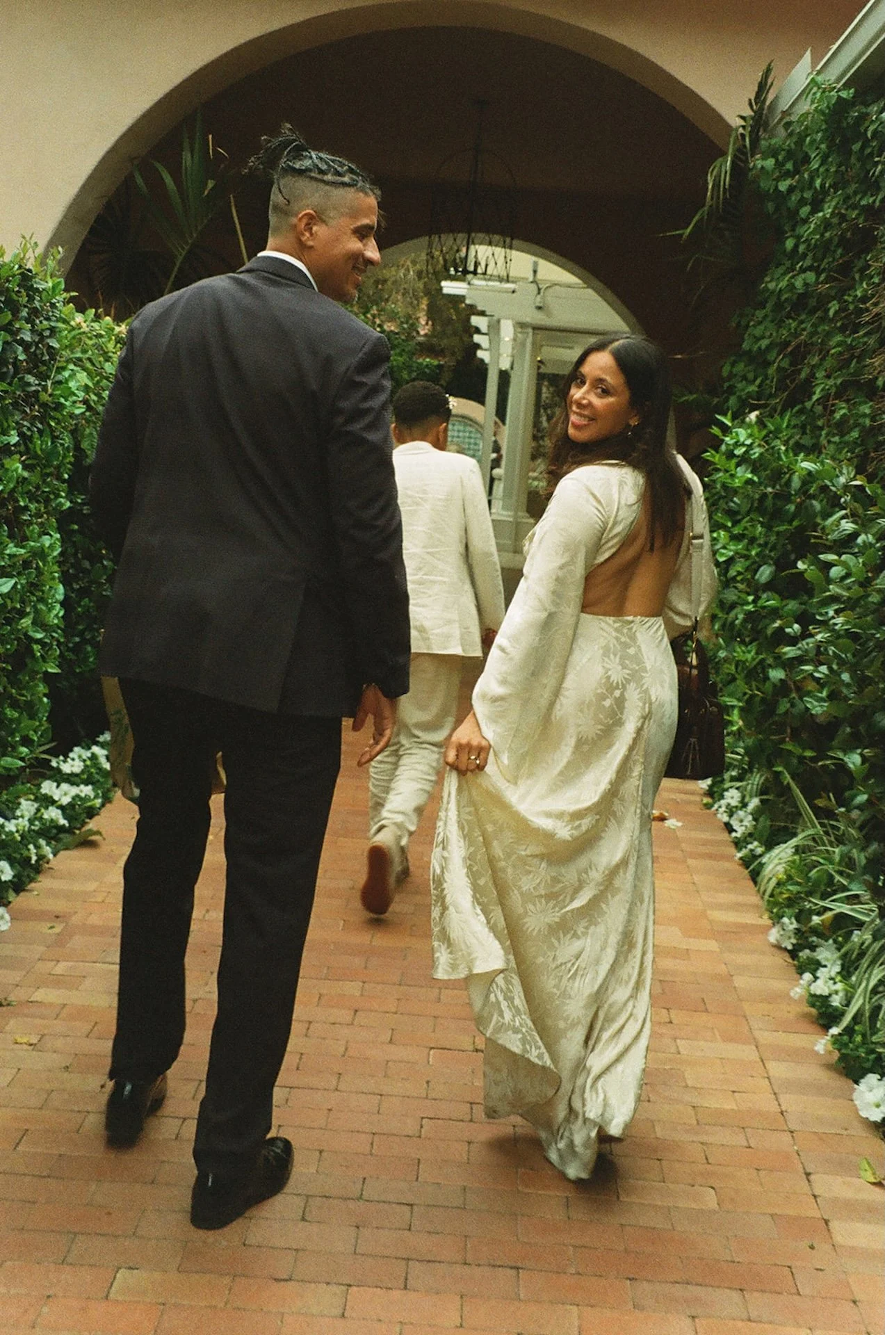 Bride and groom walking to a dinner after their Beverly Hills Courthouse Elopement