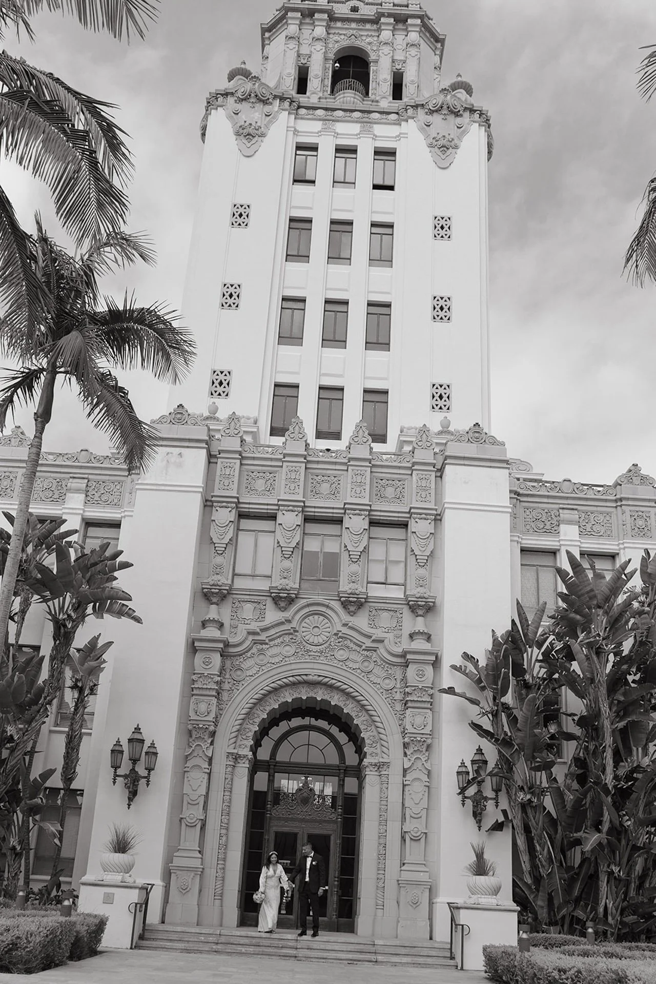 Newlyweds walking out of the Beverly Hills Courthouse