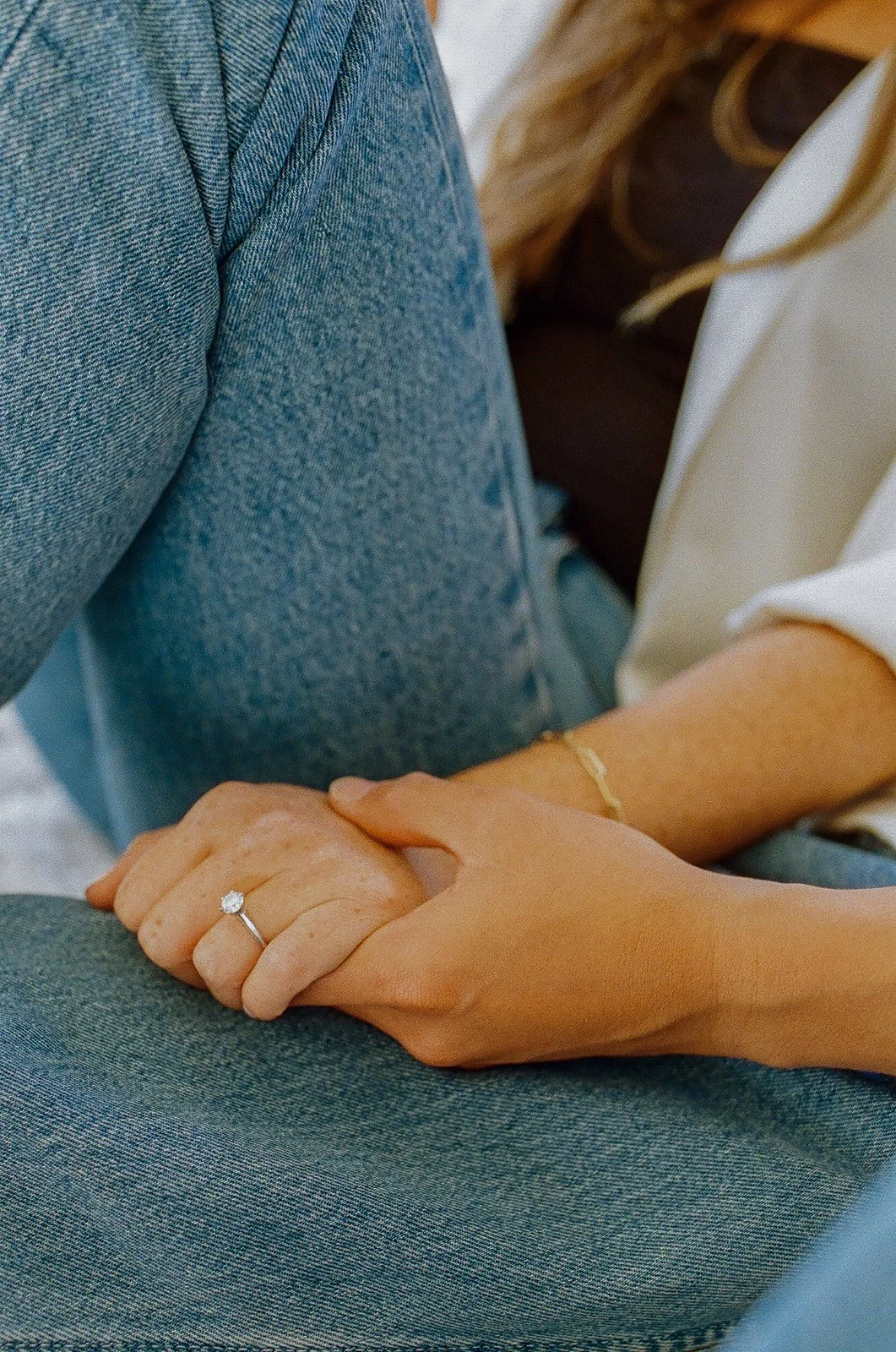 A romantic hand-holding detail shot taken at Venice Beach Photoshoot Locations with warm coastal light.
