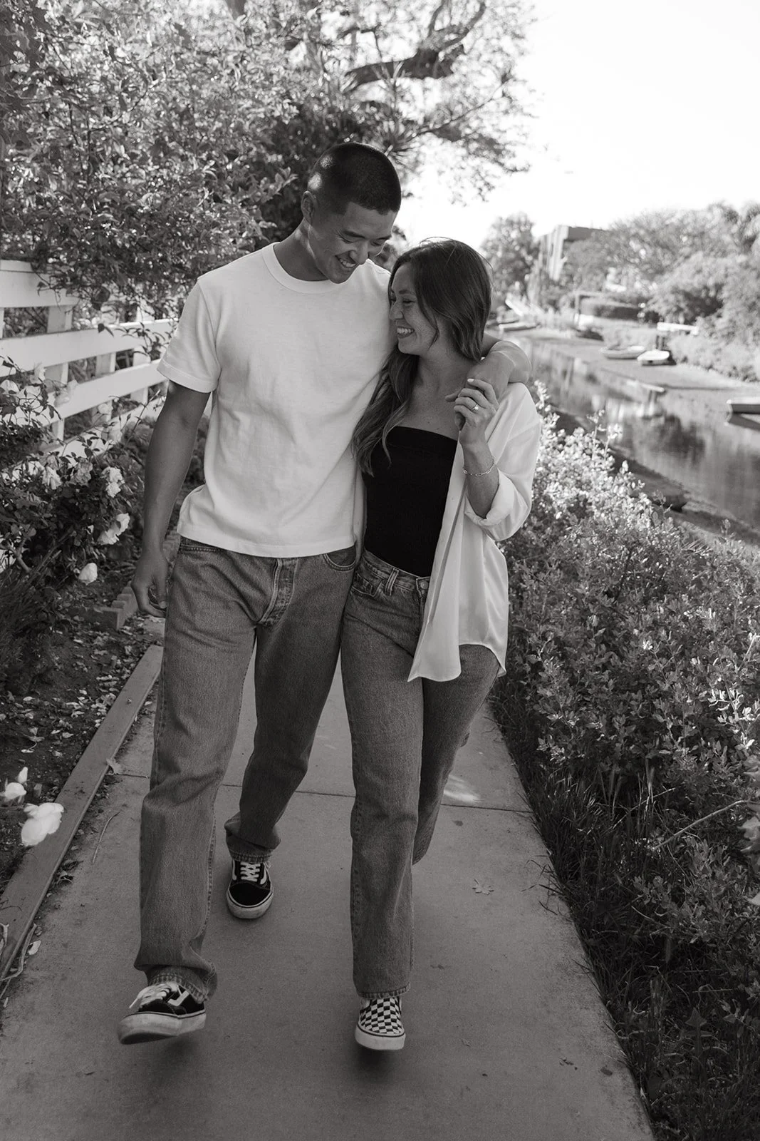 A quiet embrace captured at Venice Beach Photoshoot Locations with soft coastal light and long shadows.
