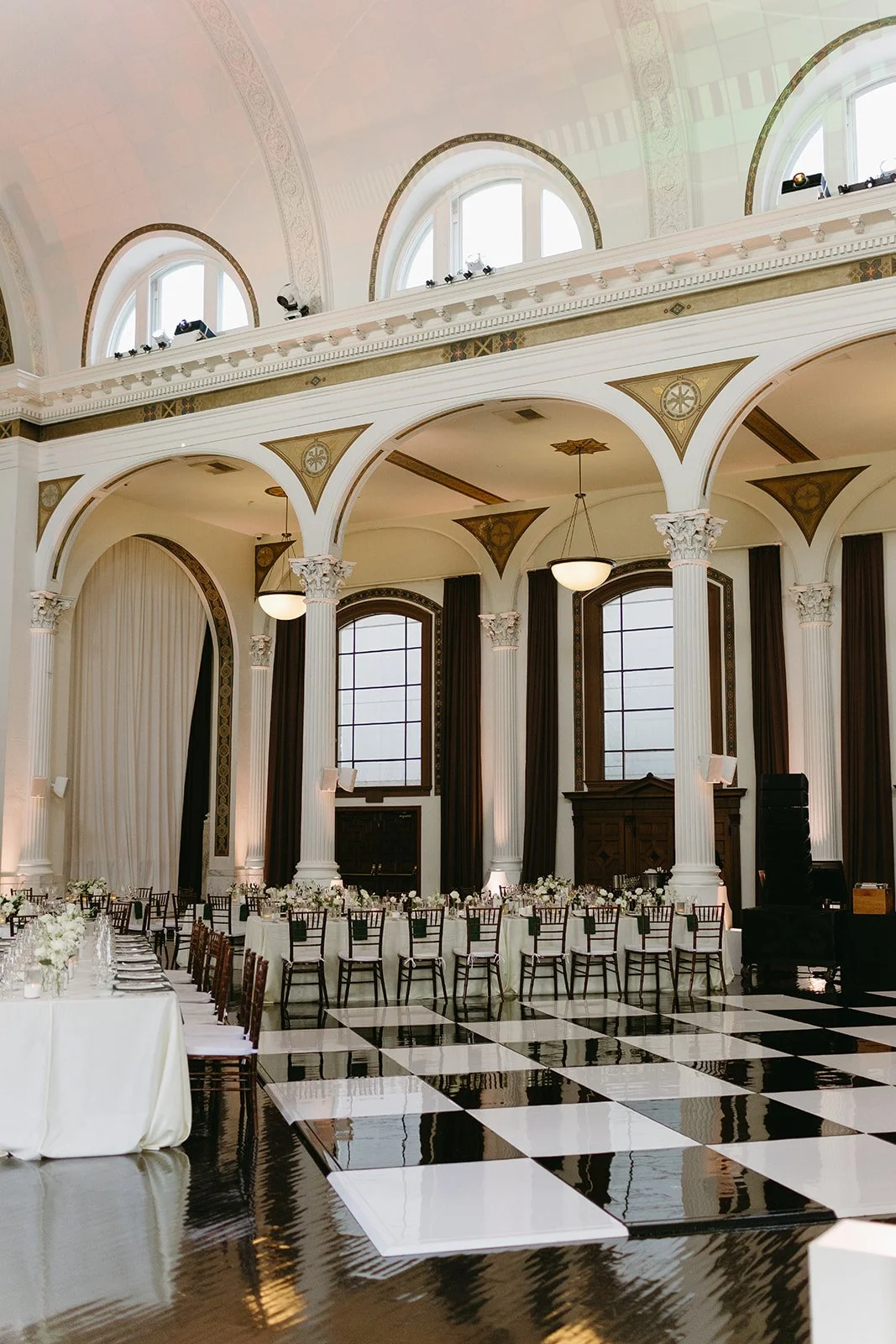 A wedding reception inside of Vibiana