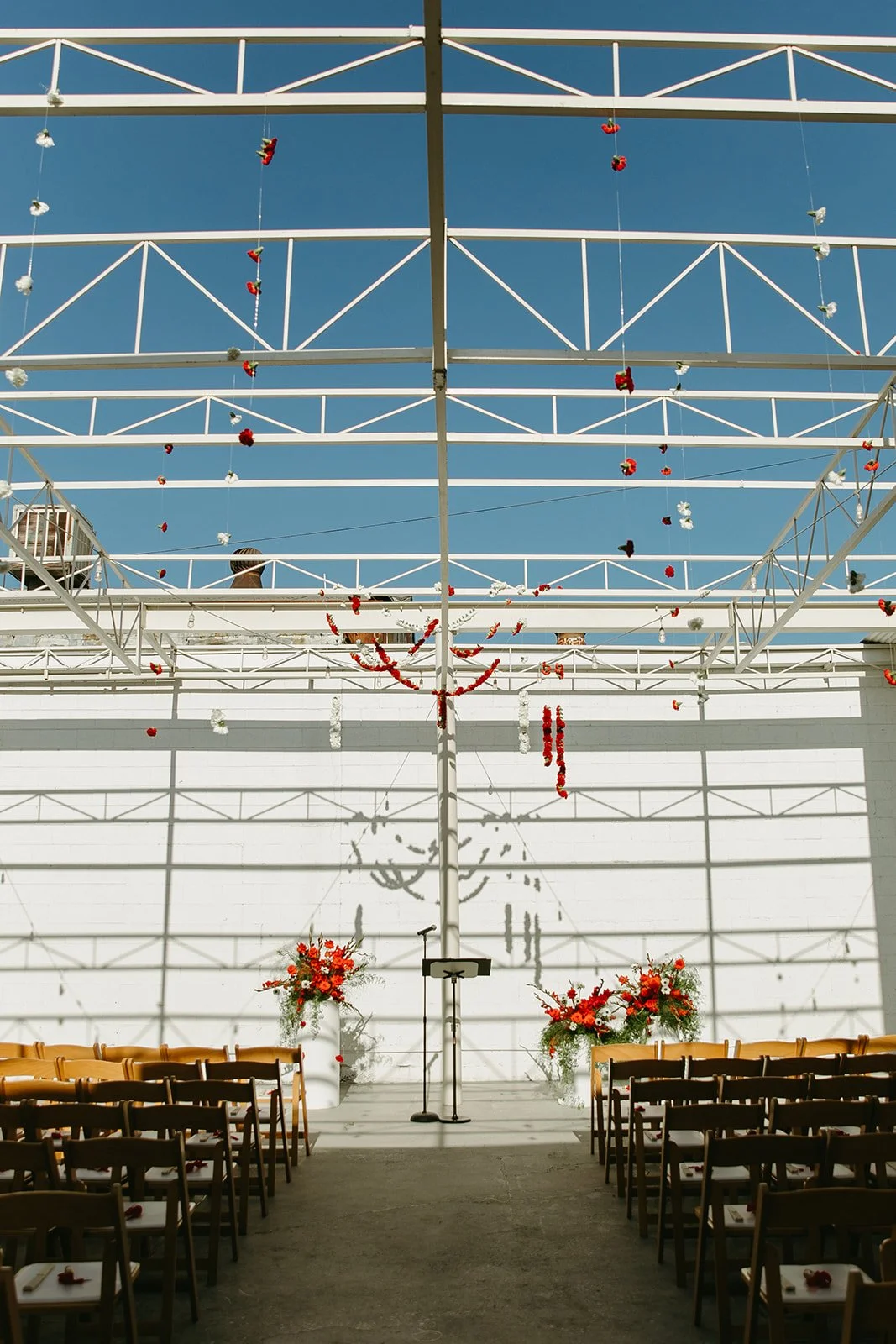 A wedding ceremony setup inside of a unique wedding venue