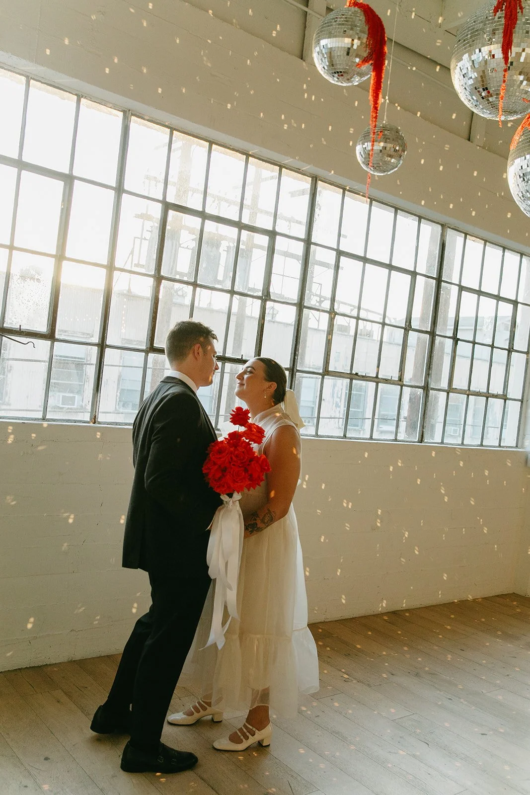 A couple dancing inside of the Revery