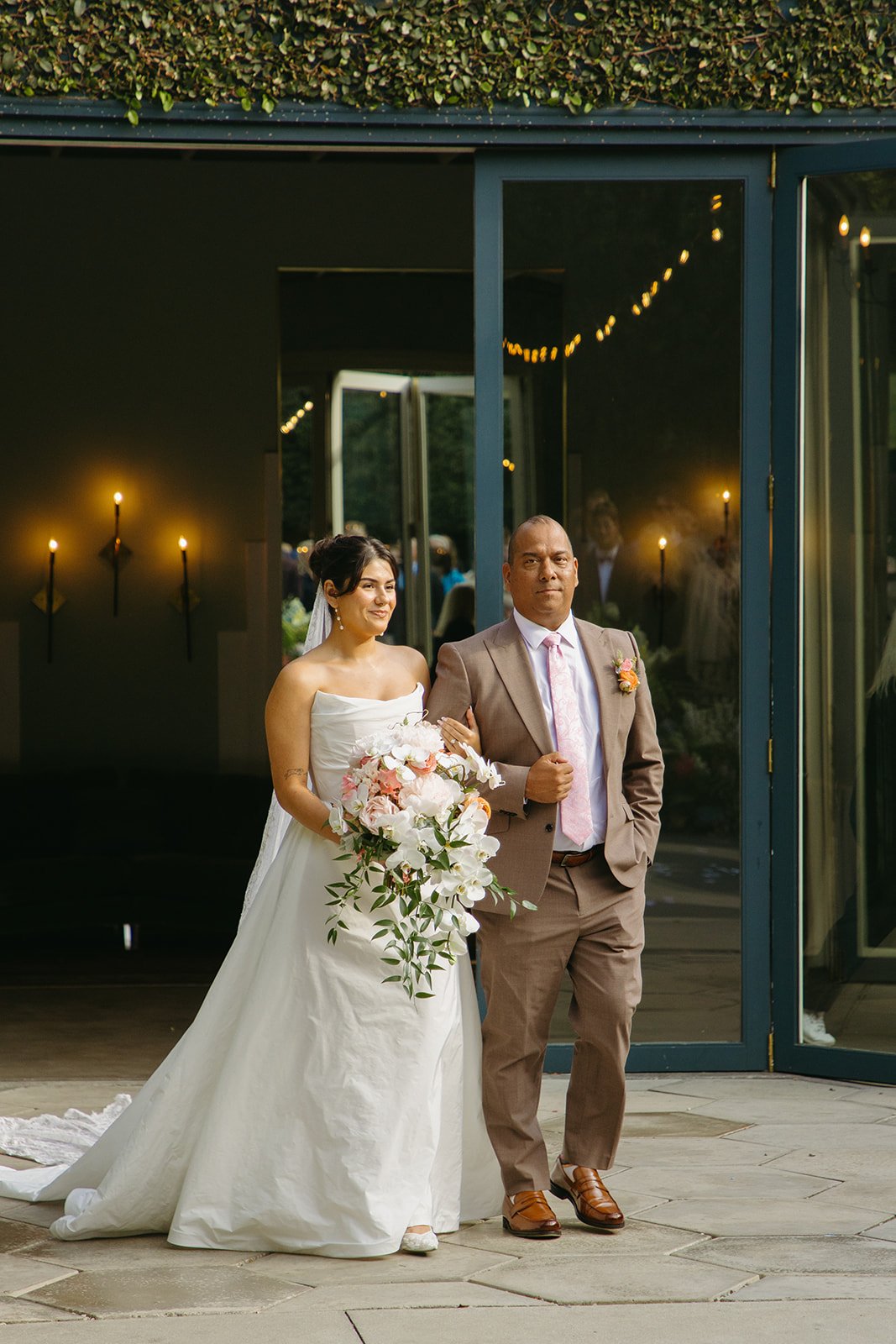 A bride walking down the aisle at her Los Angeles wedding venue