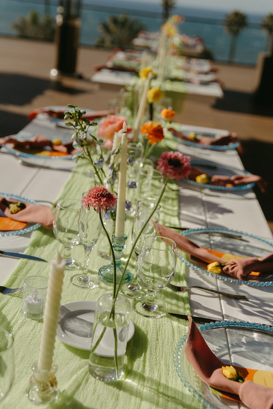 A colorful wedding reception setup outside