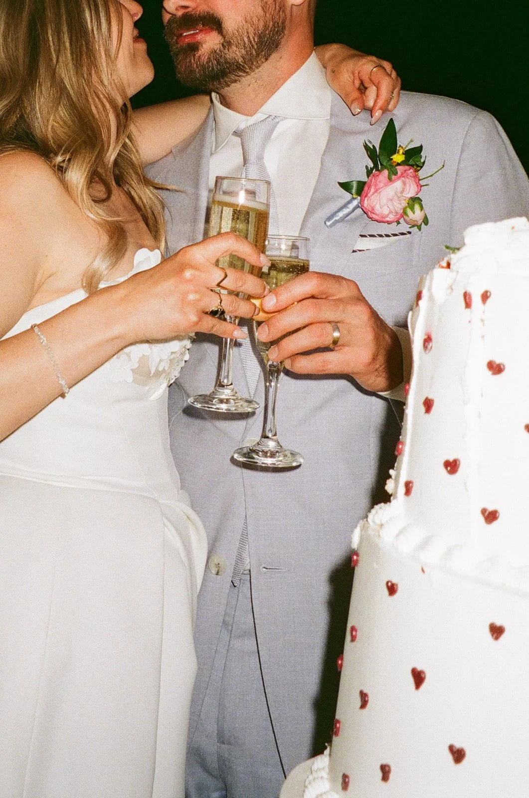 A film wedding photo of a bride and groom at their wedding reception