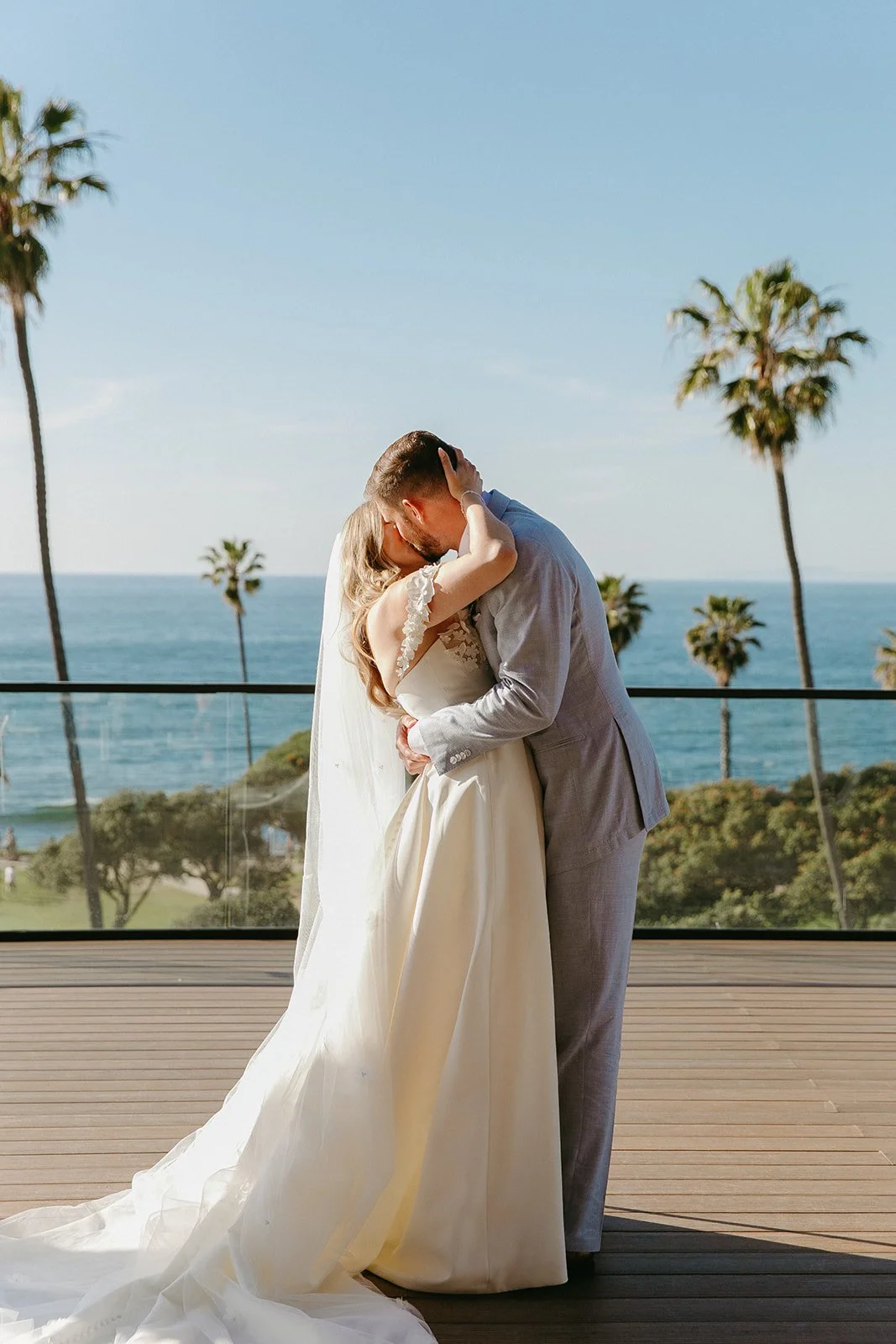 A bride and groom sharing their first kiss