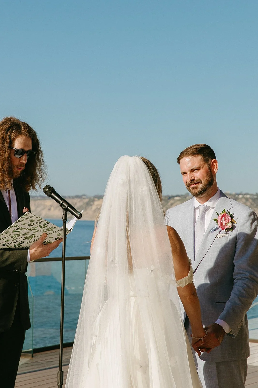 A bride and groom during a colorful wedding ceremony