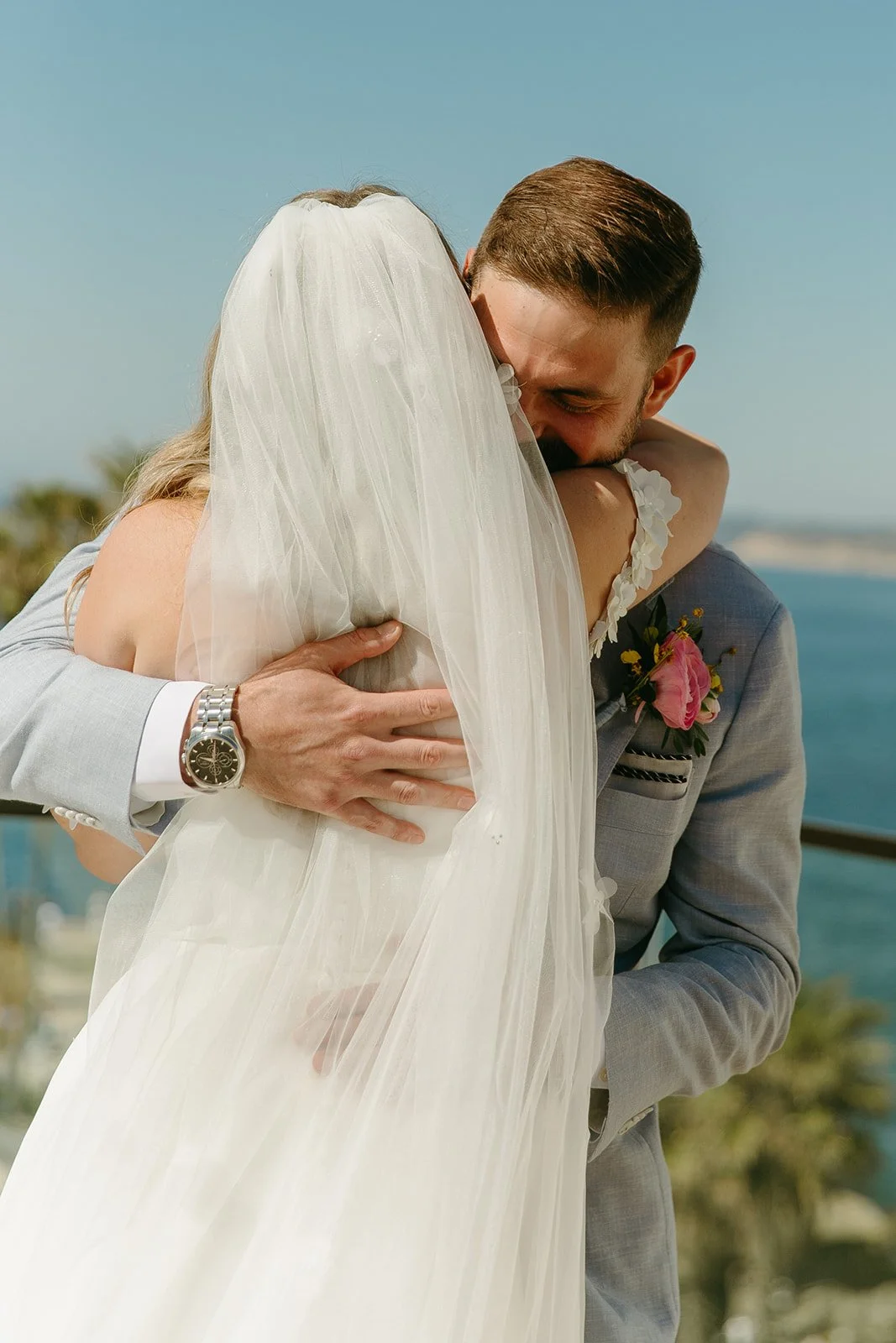 A groom's reaction to a first look with his bride