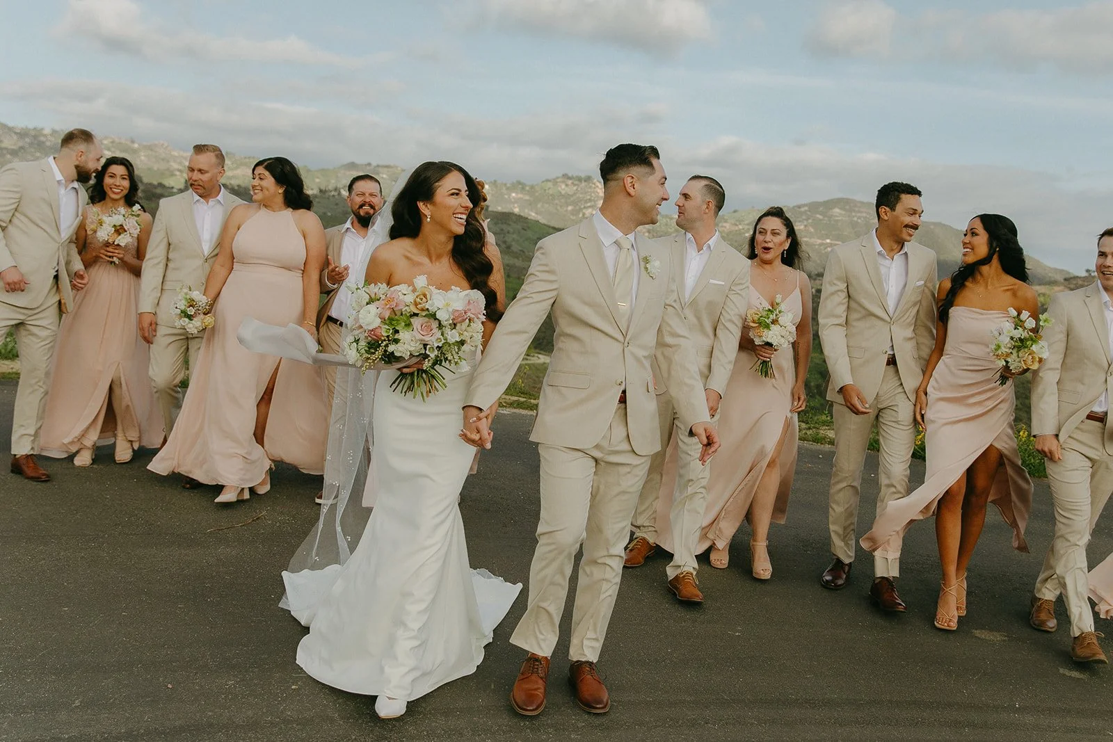 A wedding party walking at one of my favorite overlook spots at a mountain wedding venue