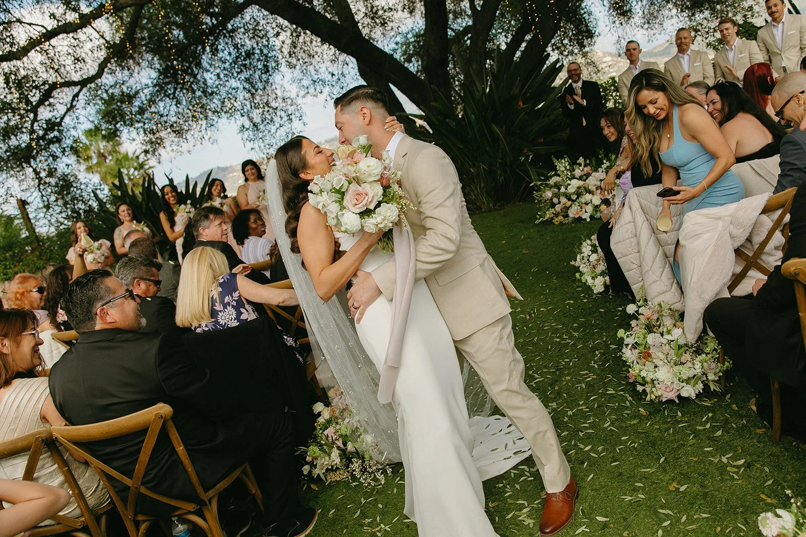 A bride and groom celebrating their wedding ceremony at Tivoli