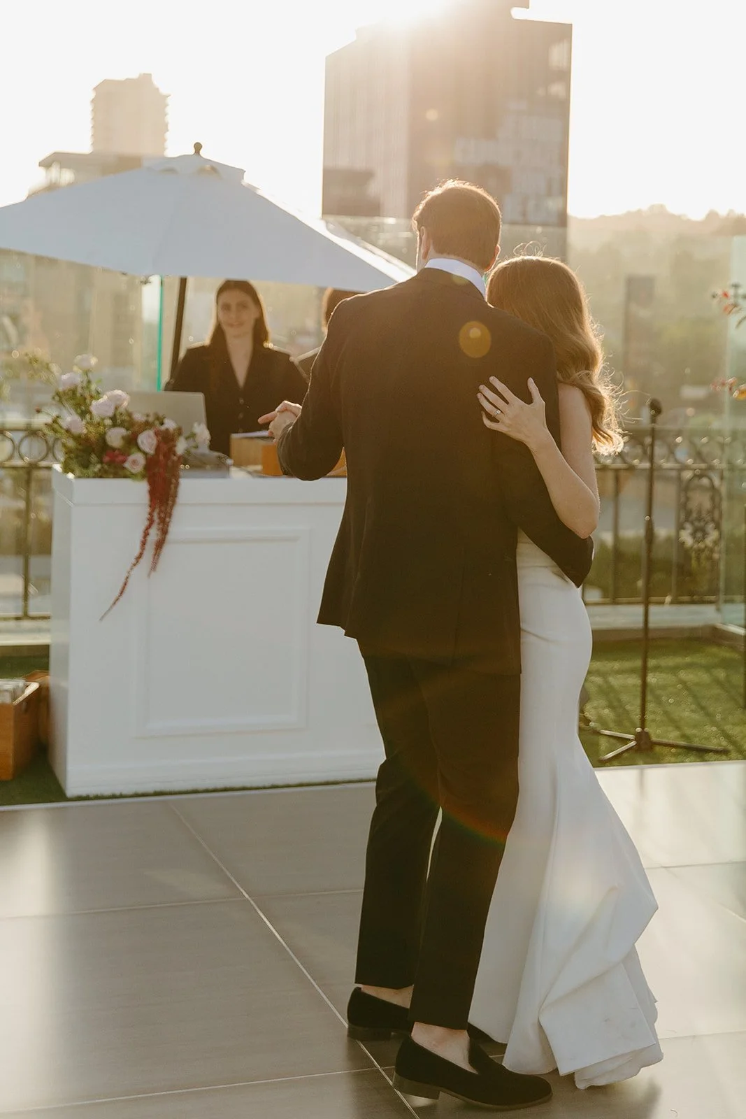 A bride and groom dancing at their wedding reception in WEst Hollywood
