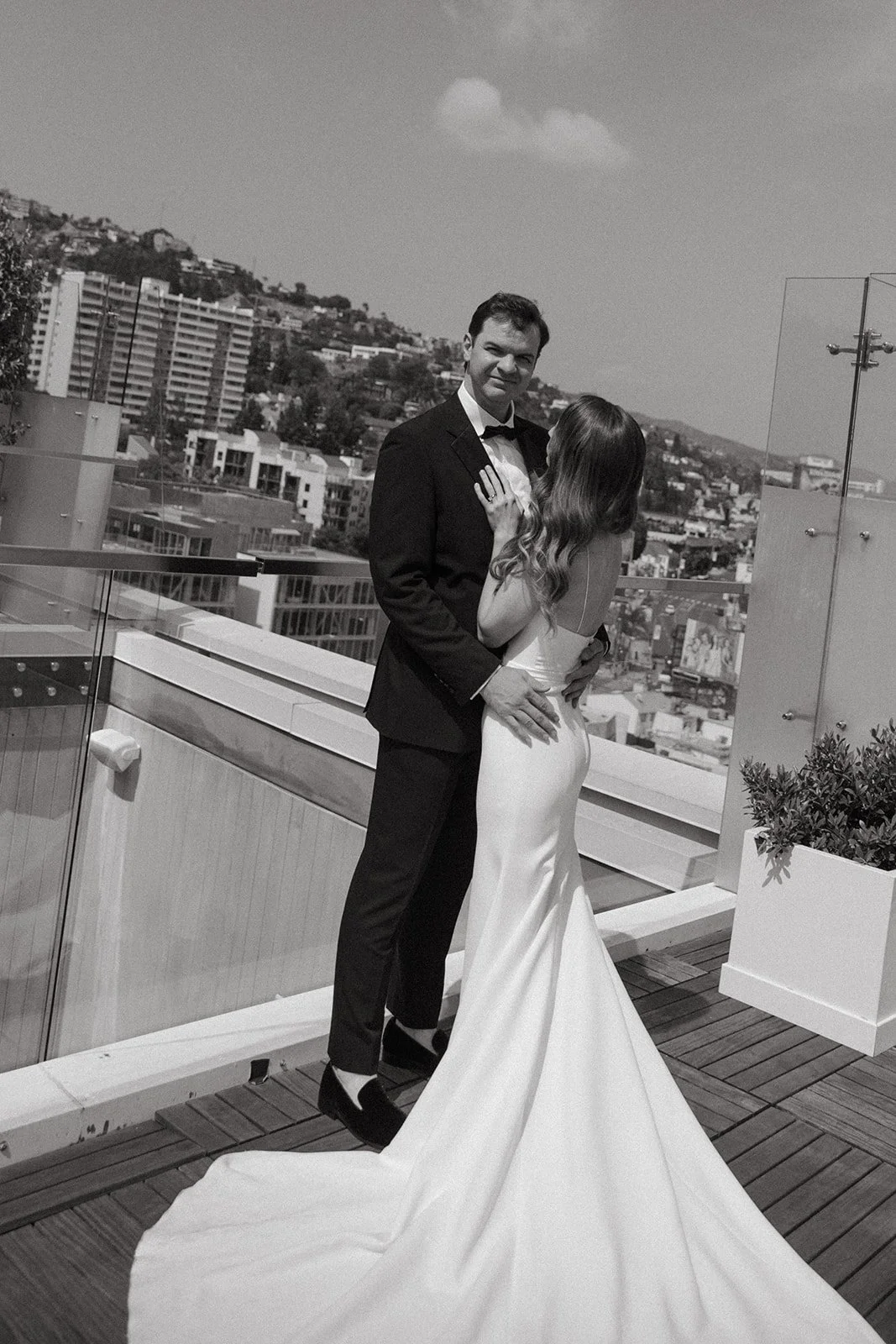 A black and white photo of a bride and groom at their west hollywood wedding venue