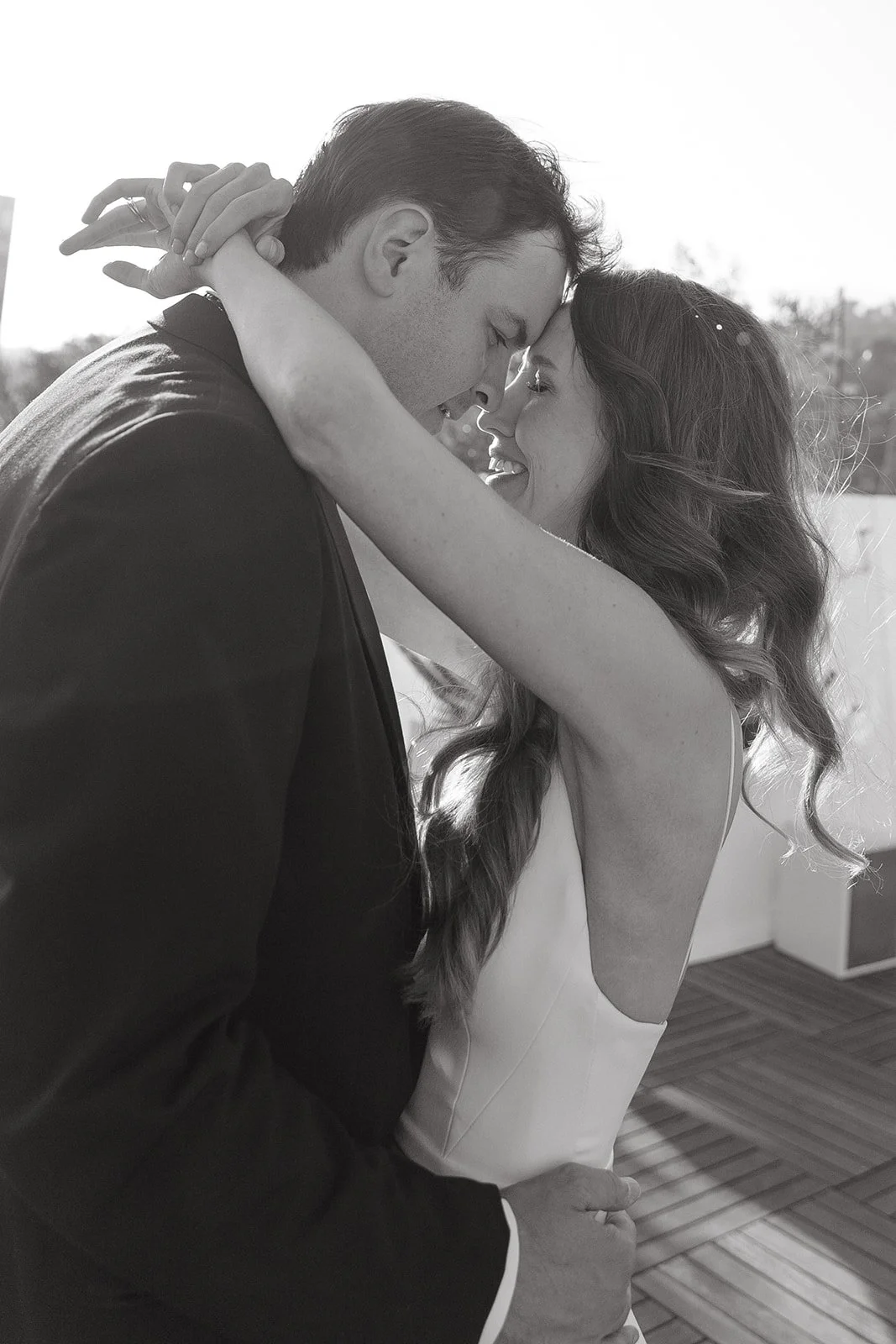 A black and white photo of a bride and groom at their west hollywood wedding venue