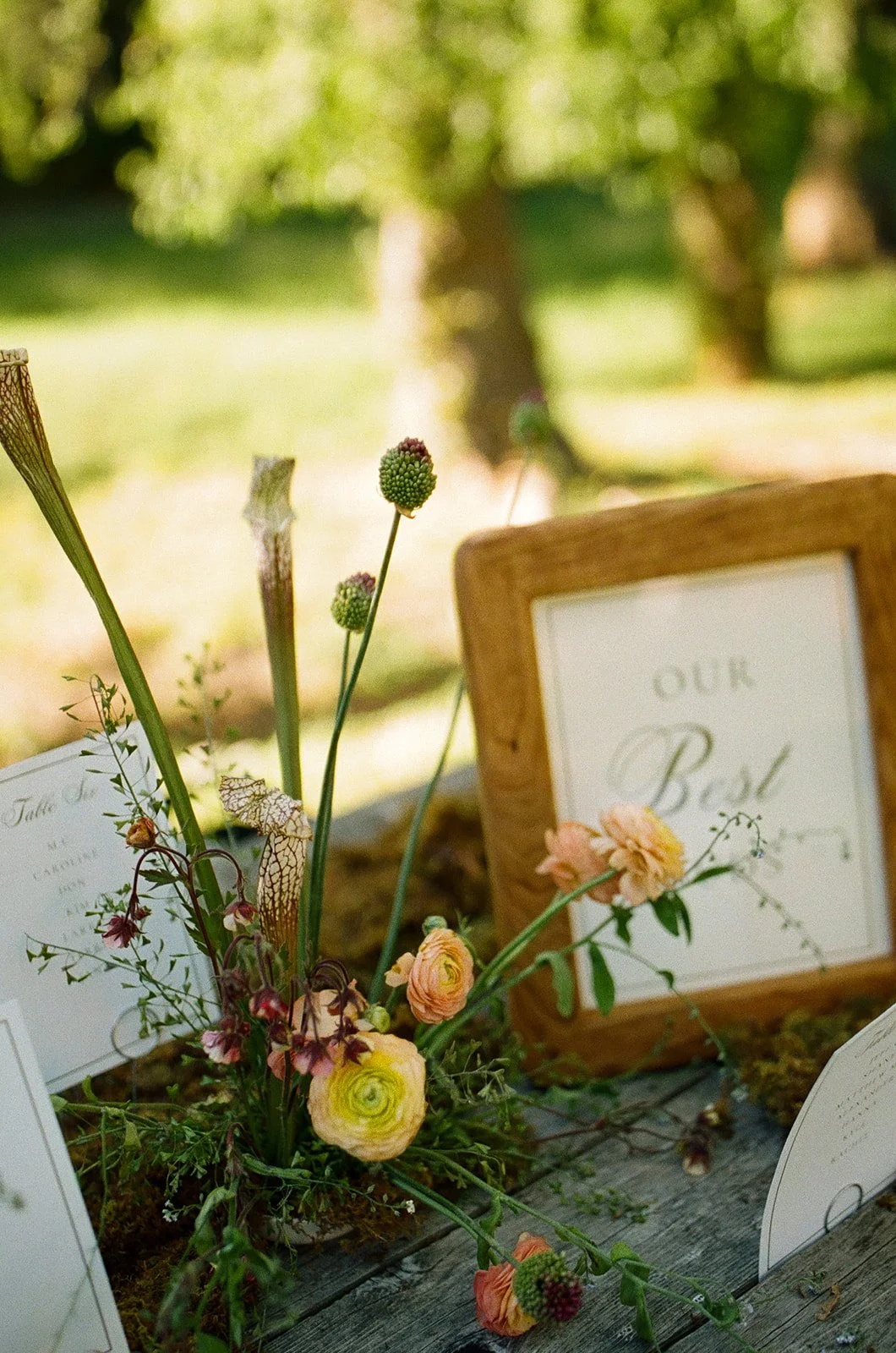 A wedding floral arrangement for a garden wedding
