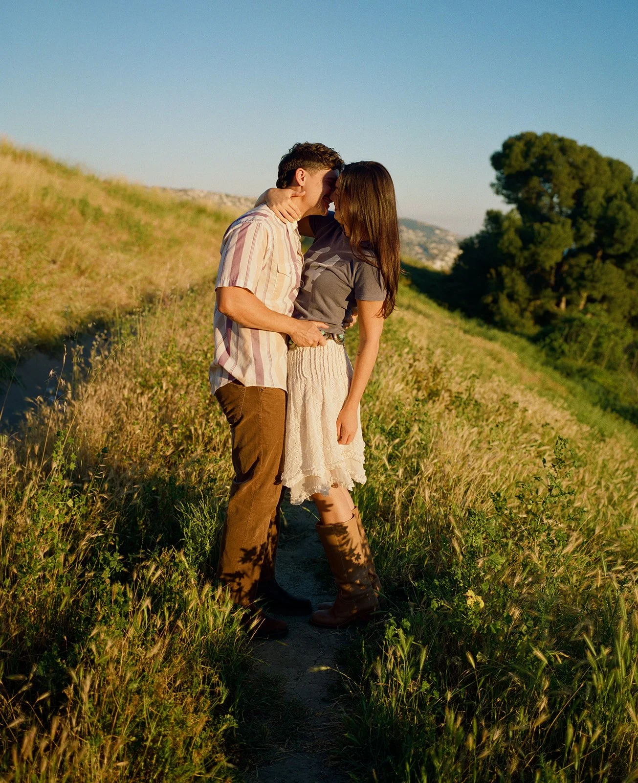 A couple posing for Laguna Beach engagement photos