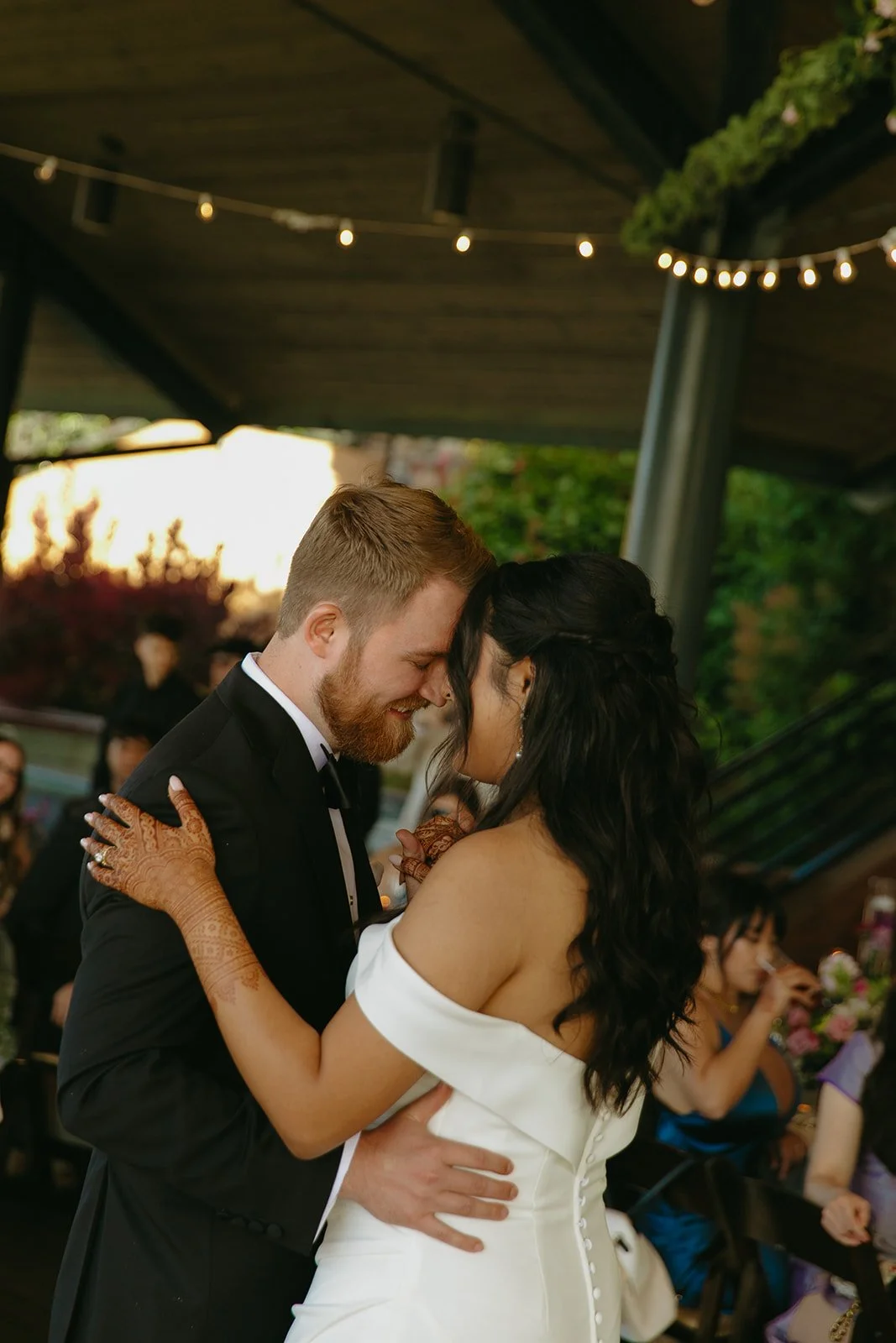 A bride and groom sharing a first dance at their wedding