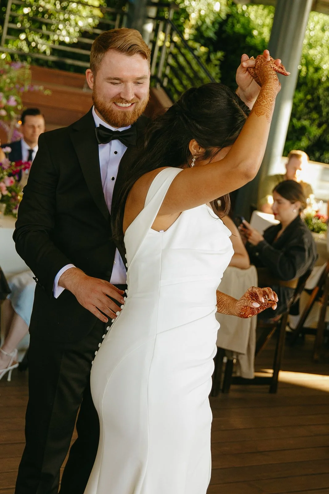 A bride and groom sharing a first dance at their wedding