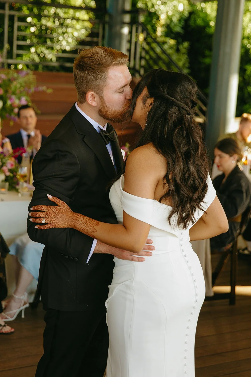 A bride and groom sharing a first dance at their wedding