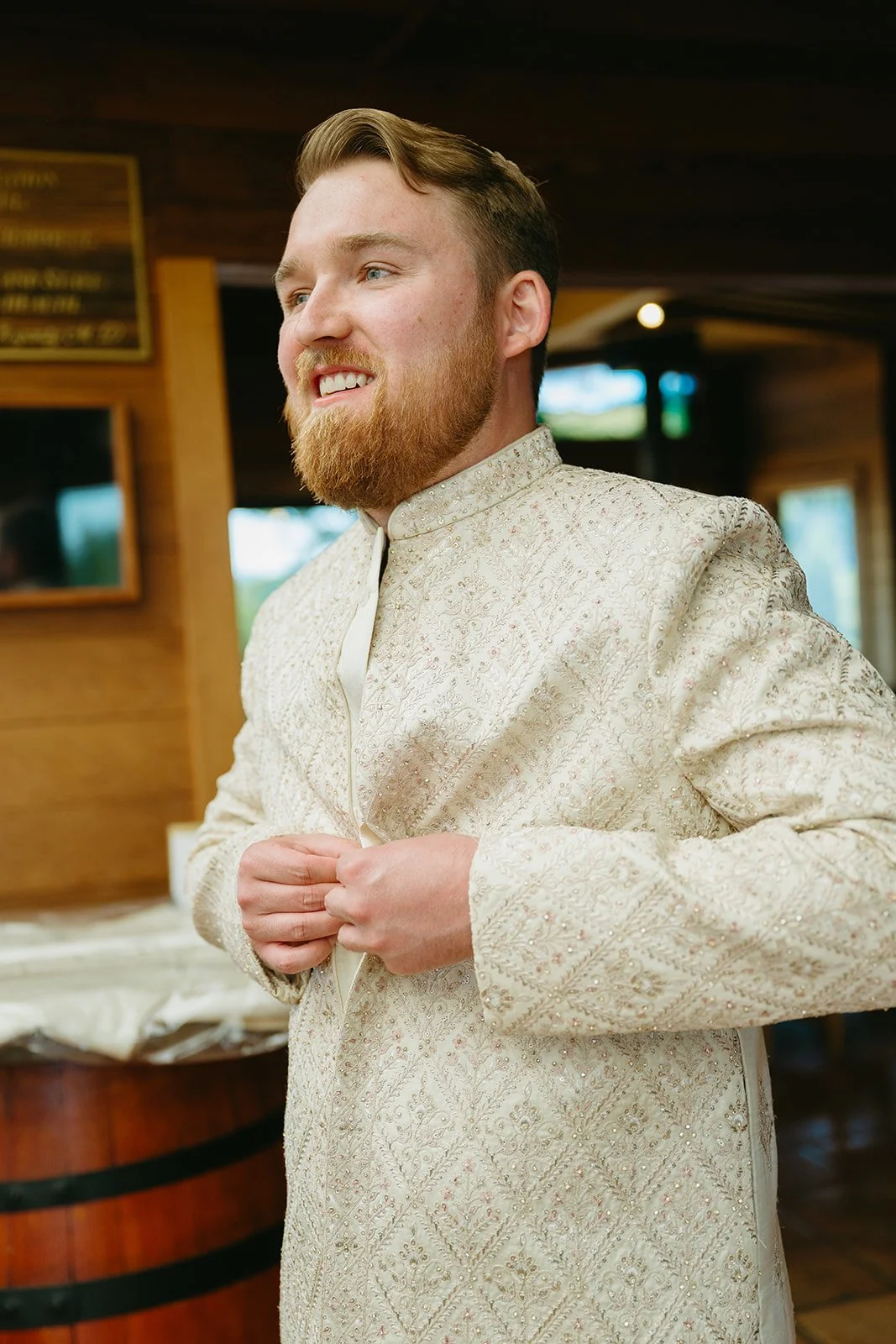 A man honoring wedding traditions of India in traditional Indian wedding attire