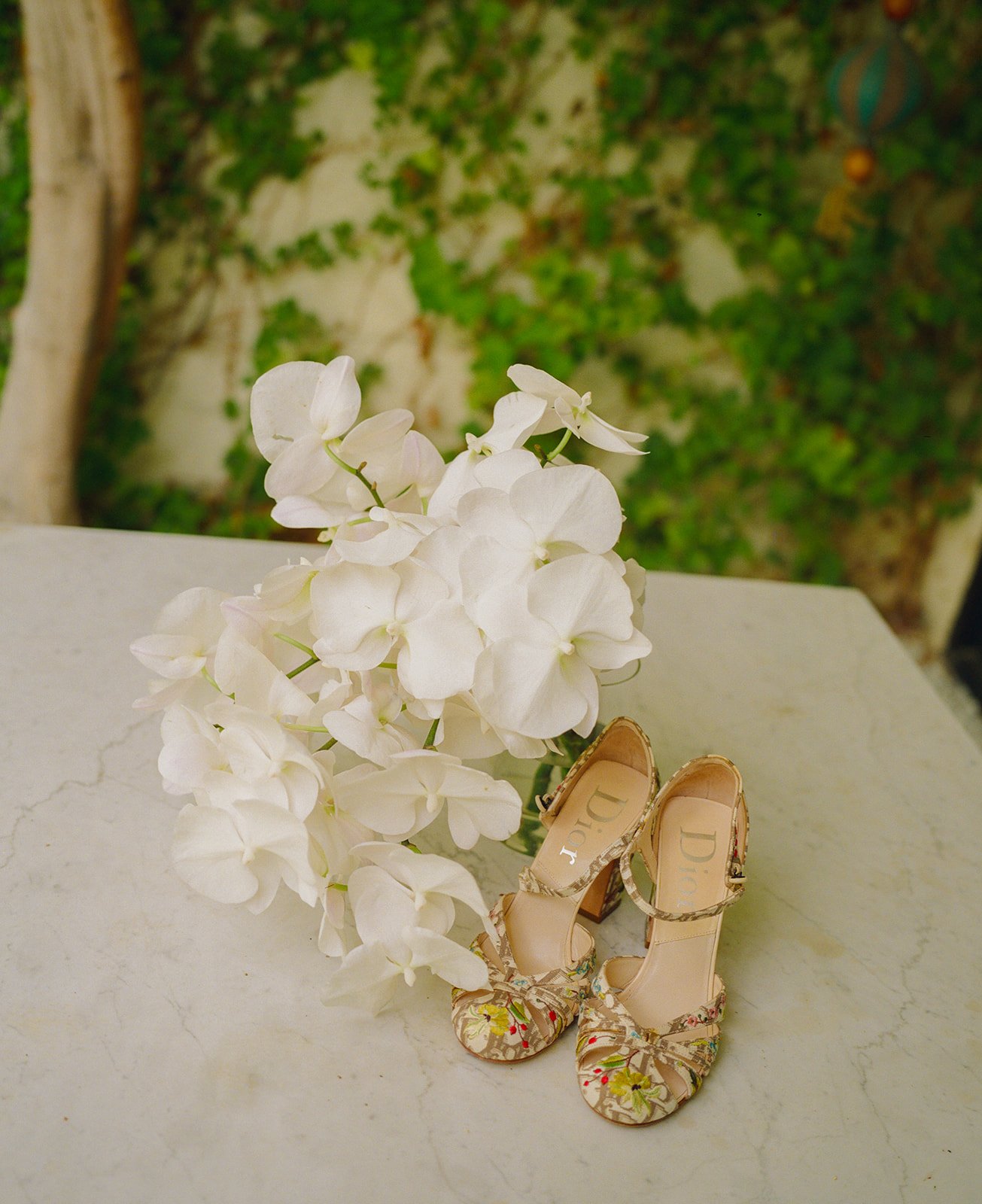 A bride's shoes and wedding bouquet for a Palm Springs wedding