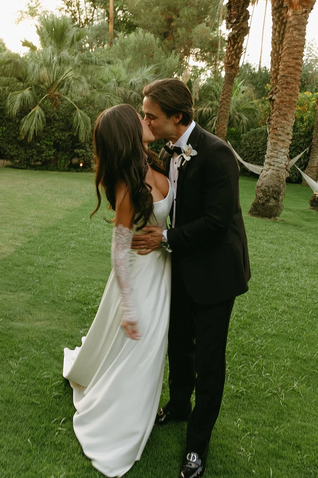 A bride and groom kissing