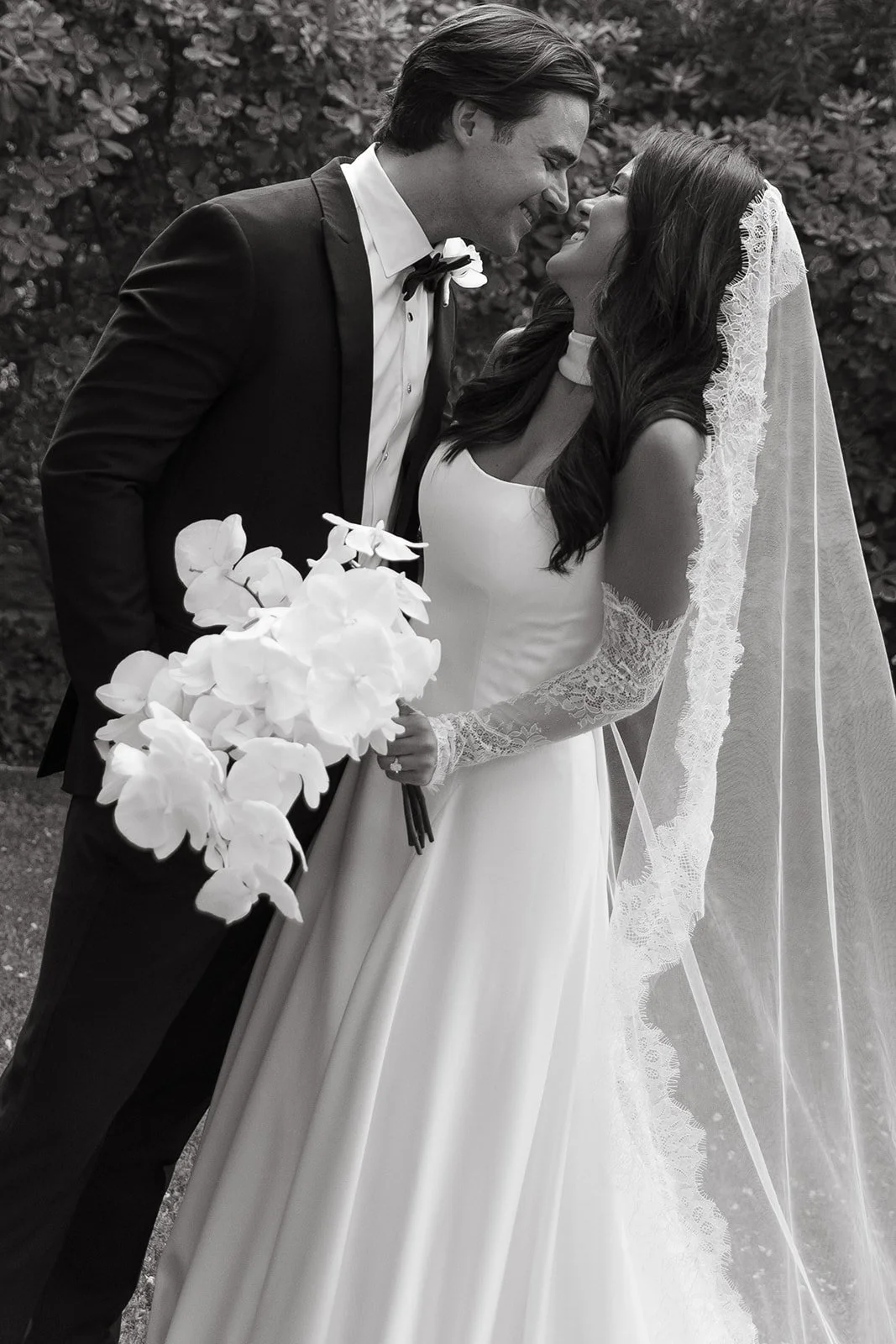 A bride and groom kissing in a Palm Springs wedding photo