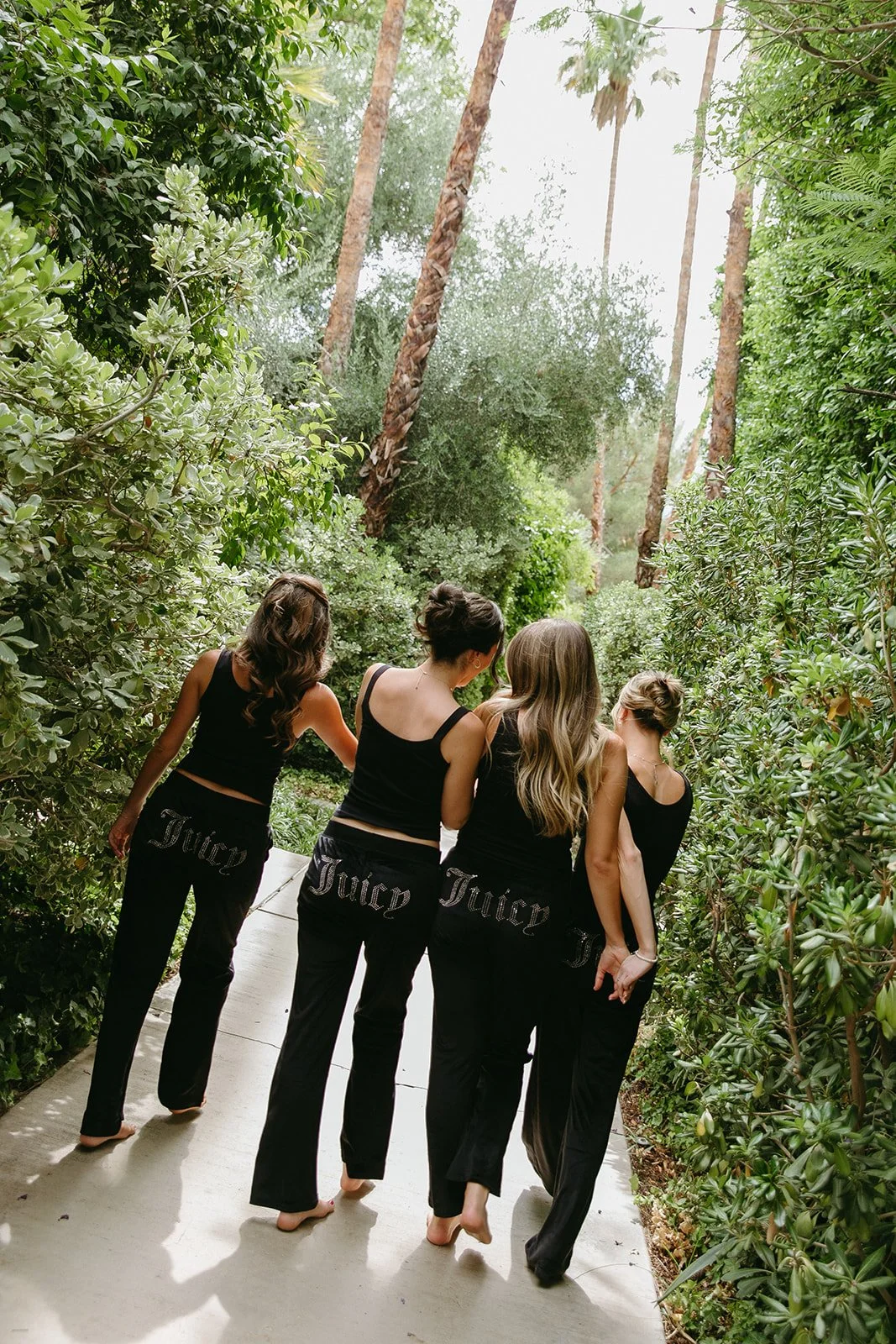 Bridesmaids walking to get ready for a Palm Springs wedding