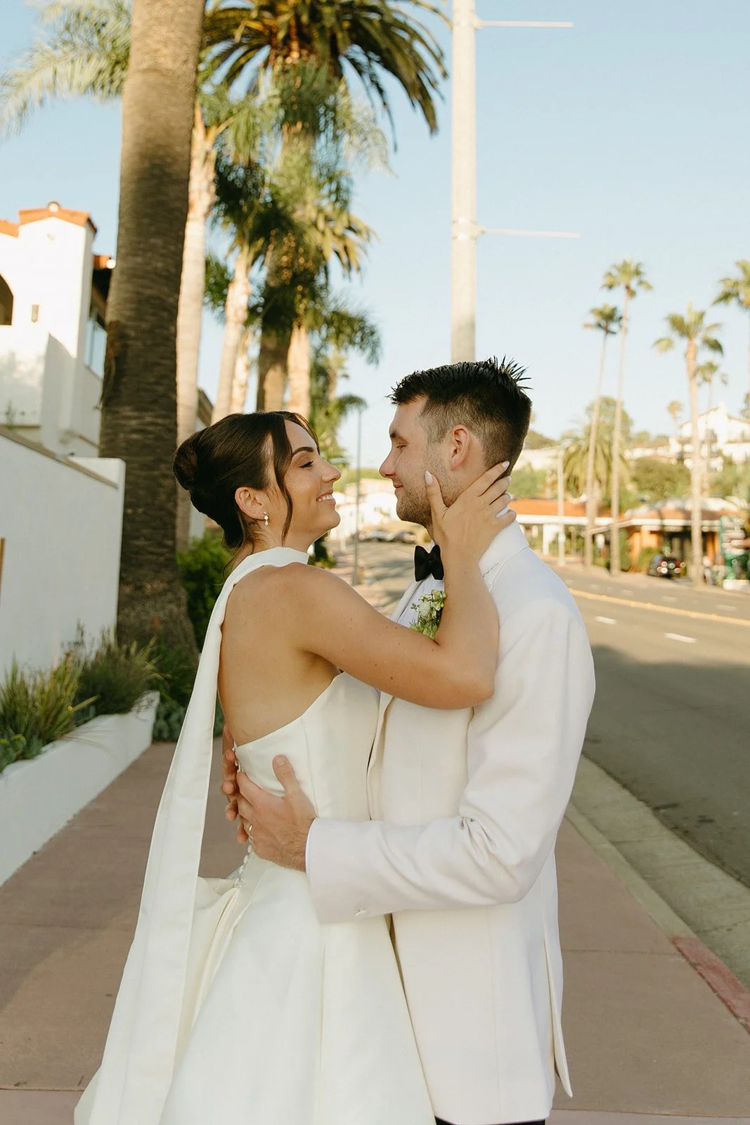 A bride and groom taking San Clemente wedding photos