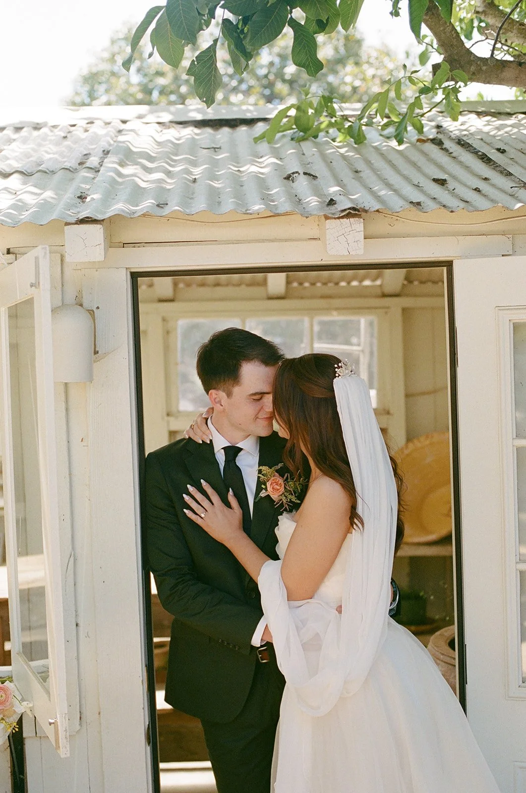 A bride and groom posing for small wedding ideas at Bodega Los Alamos