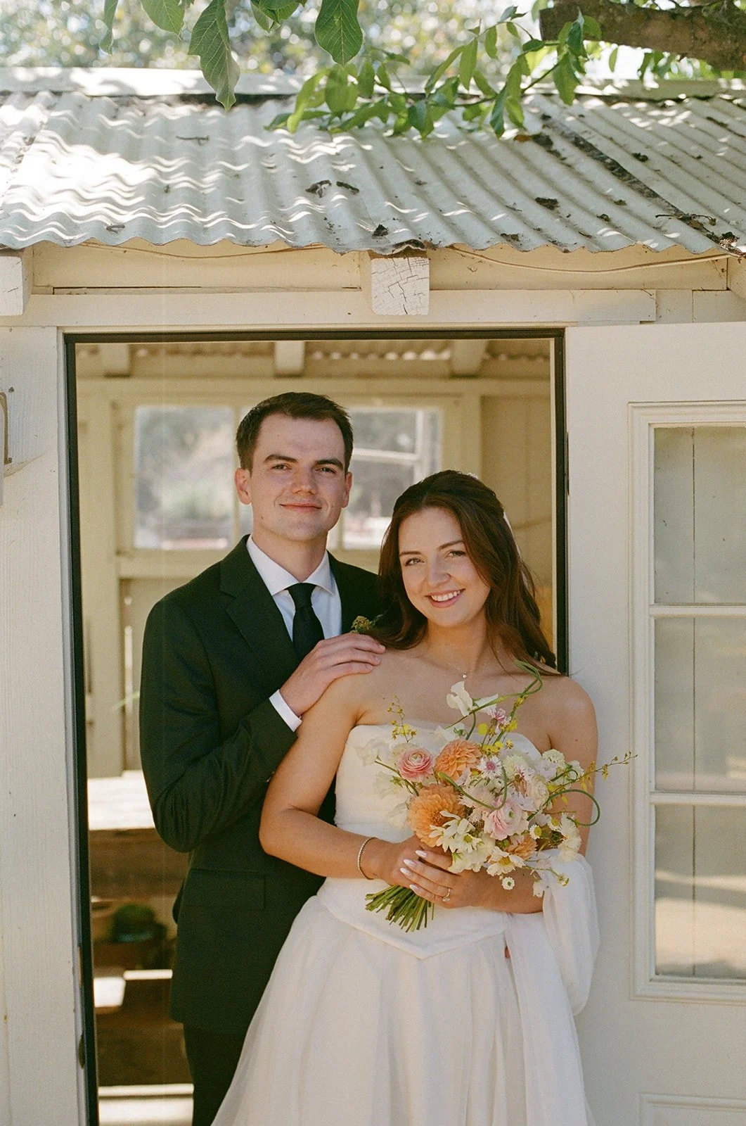 A bride and groom posing for small wedding ideas at Bodega Los Alamos
