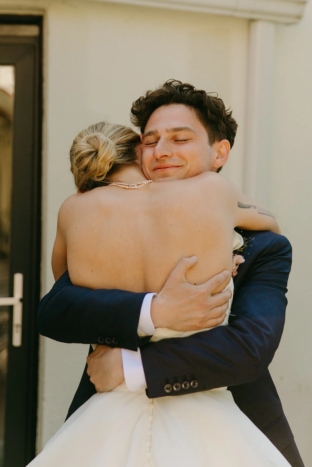 A bride and groom during their first look