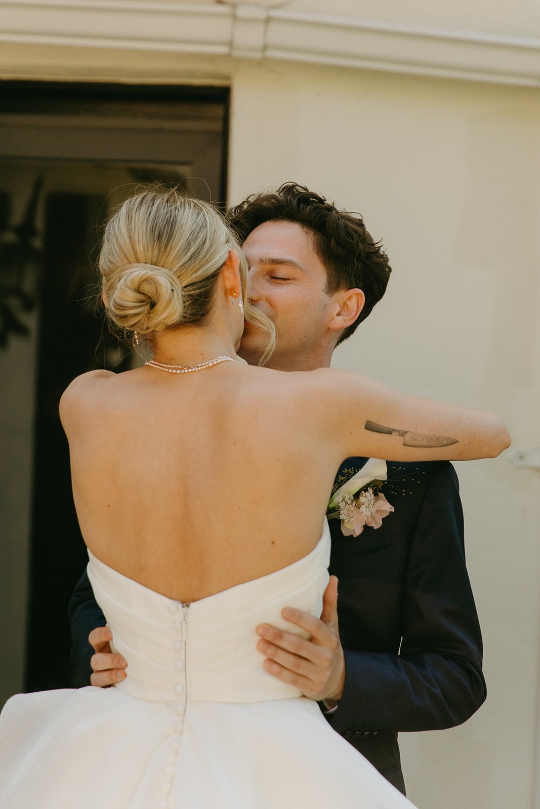 A bride and groom during their first look