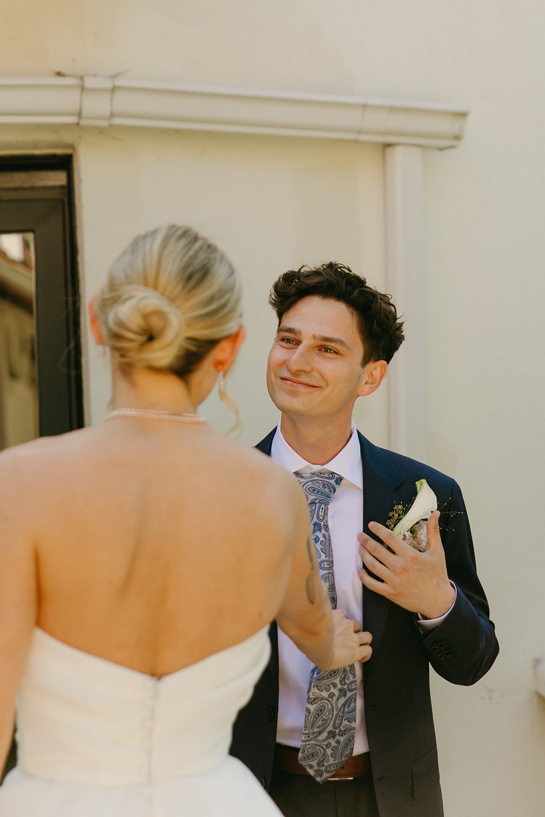 A bride and groom during their first look