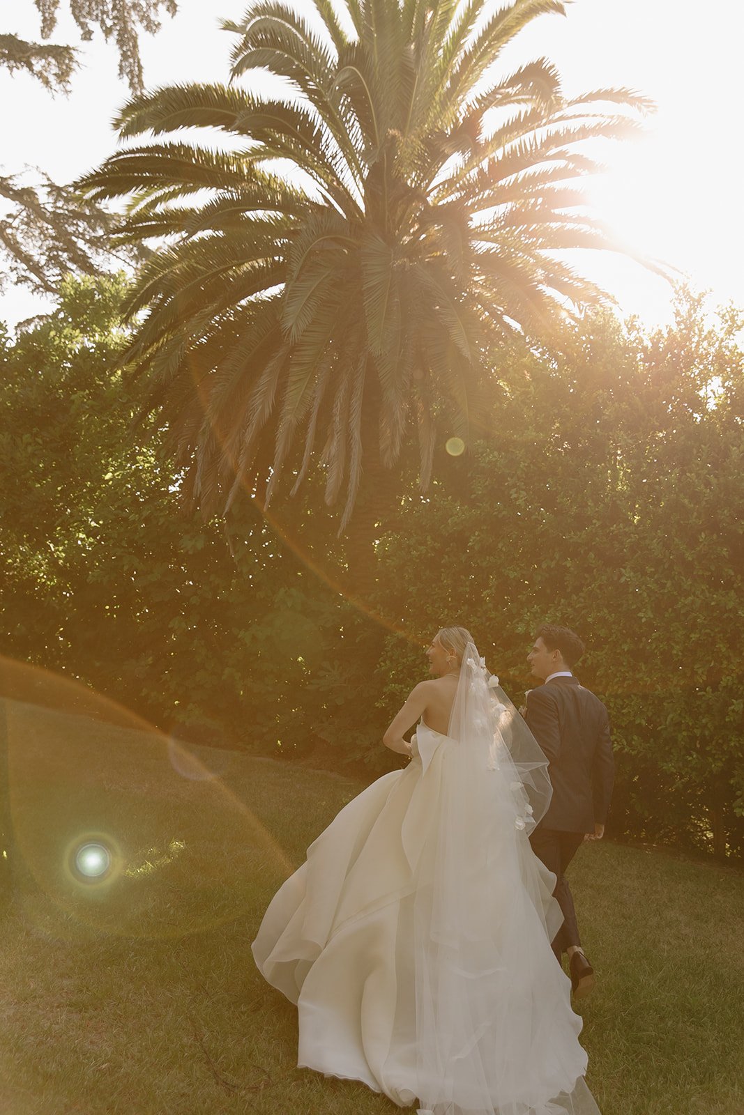 A bride and groom exiting their wedding ceremony